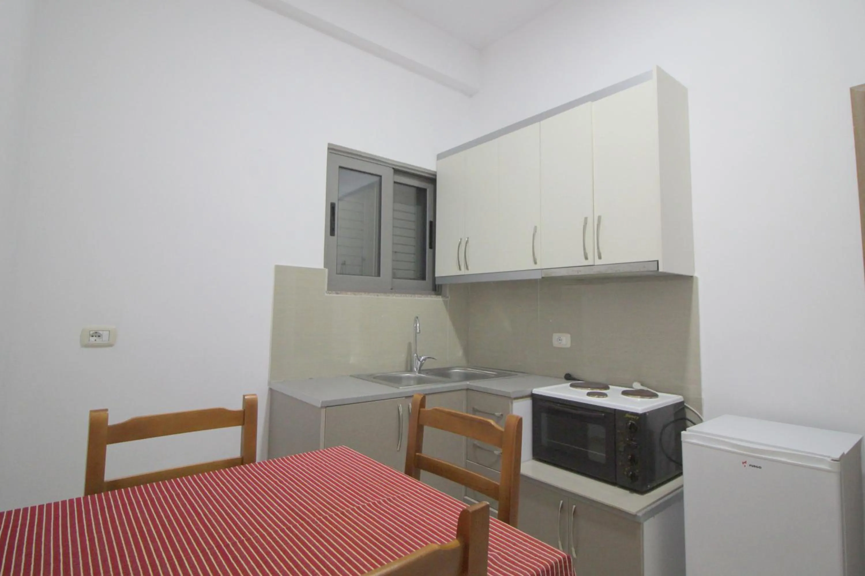 Kitchen or kitchenette in Hotel Argjiro