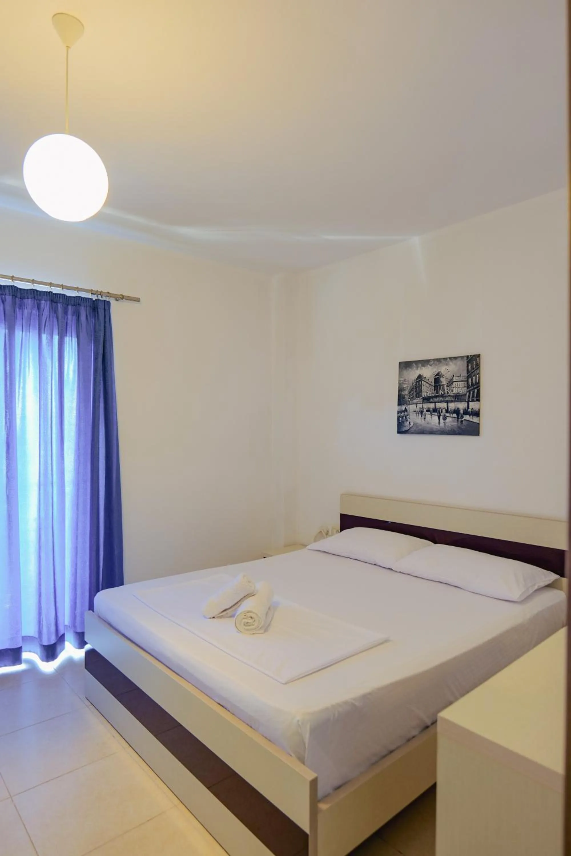 Bed in Hotel Argjiro