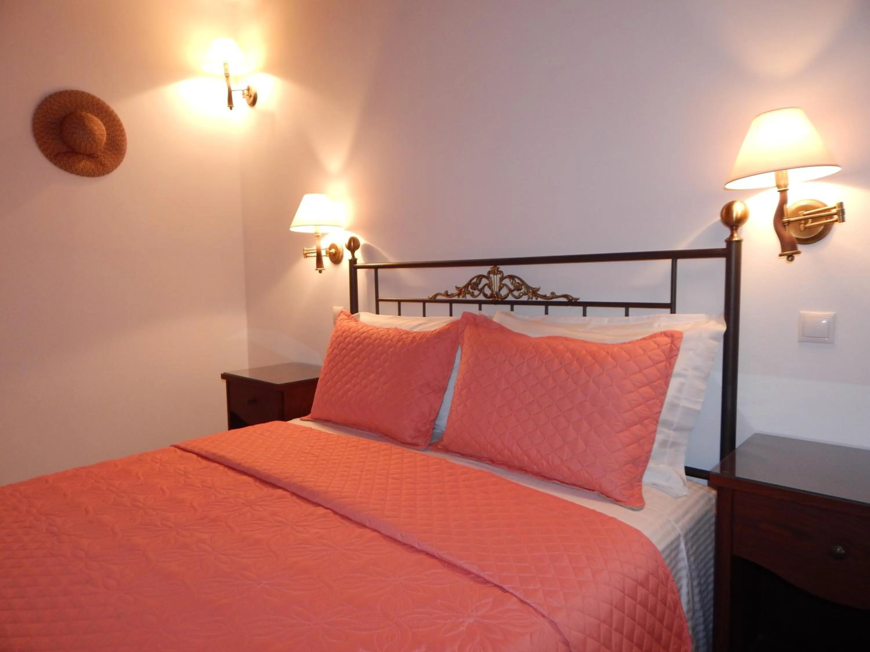 Bed in Tinos Suites & Apartments