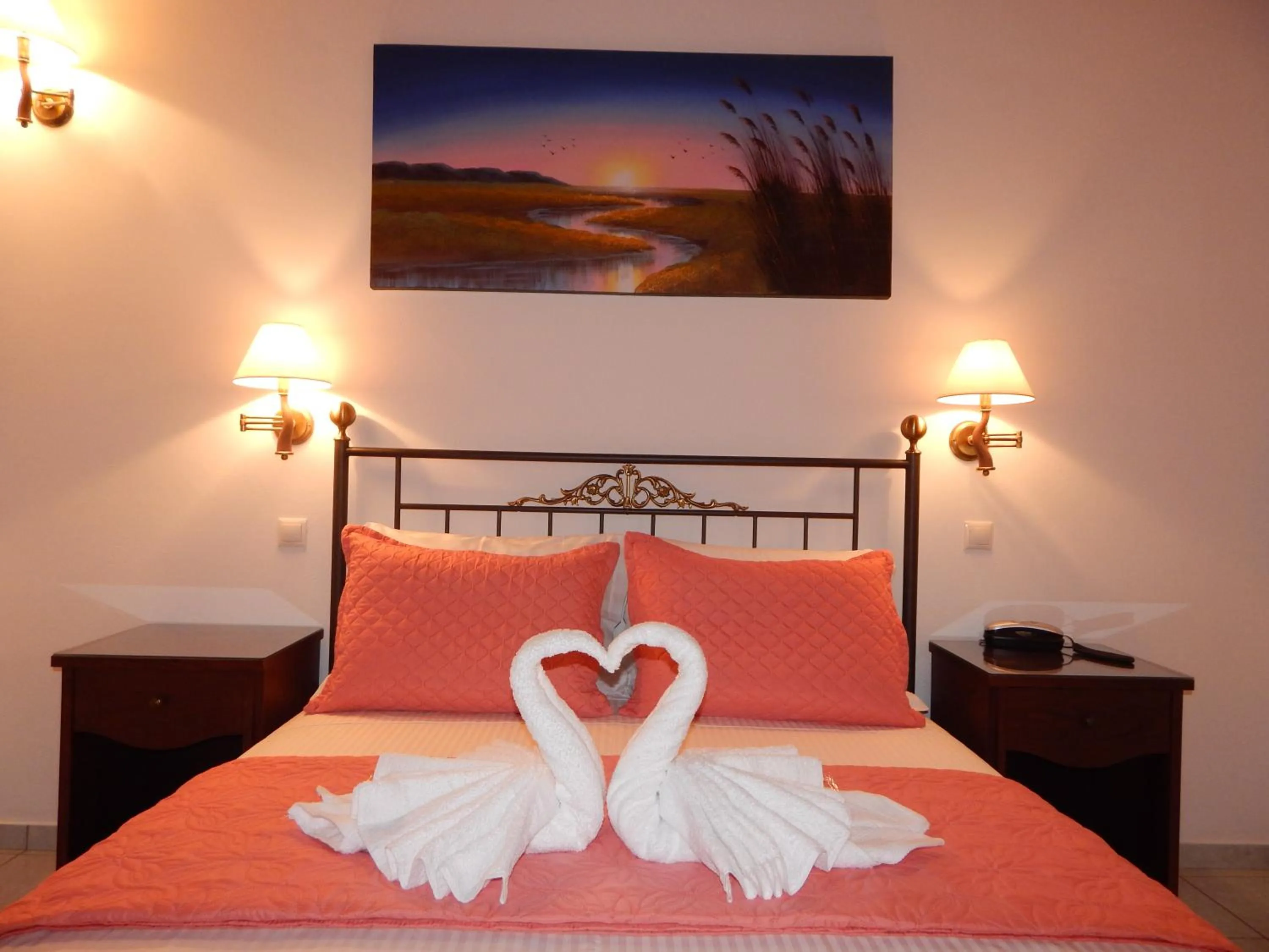 Bed in Tinos Suites & Apartments