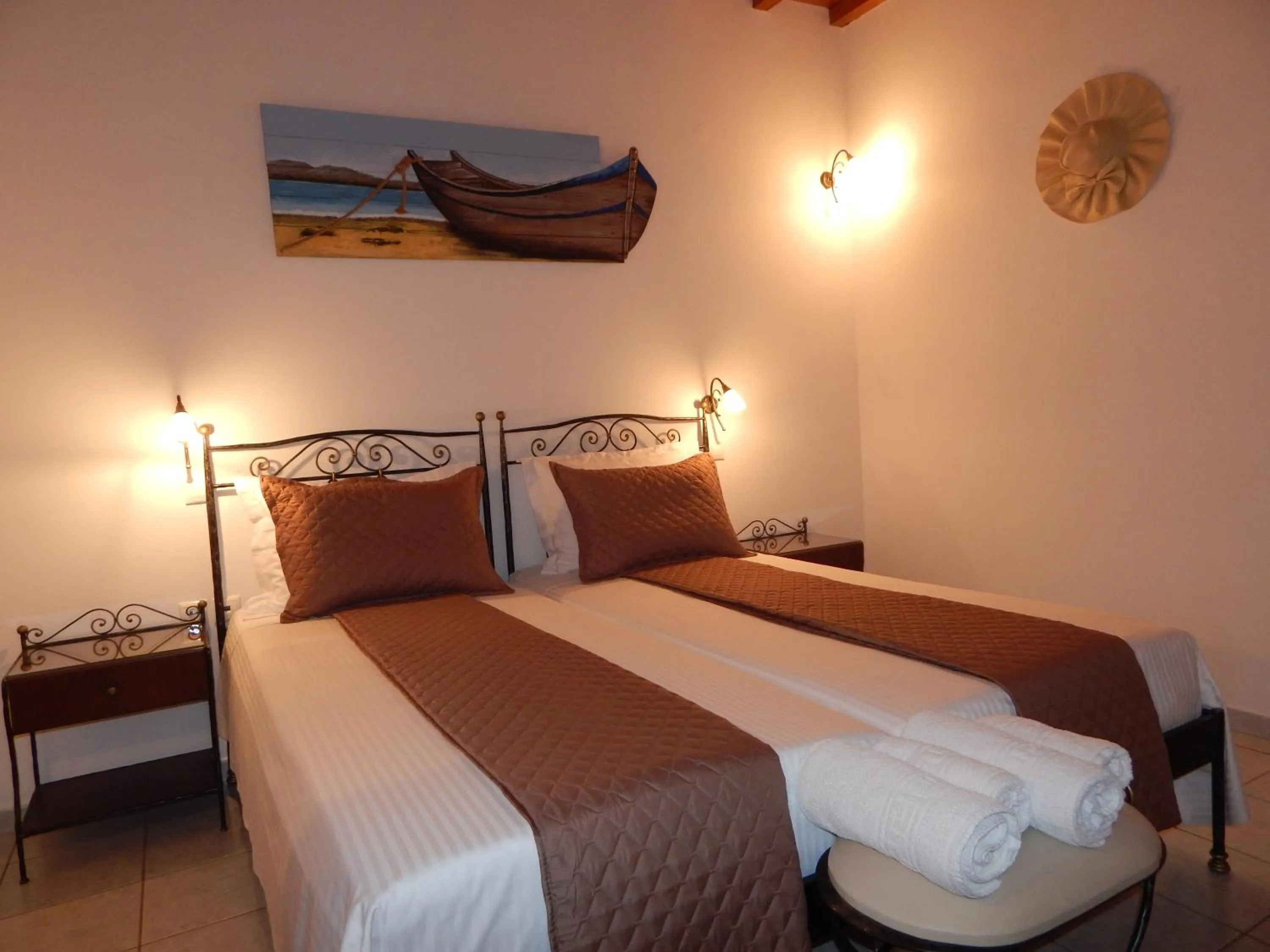 Bed in Tinos Suites & Apartments