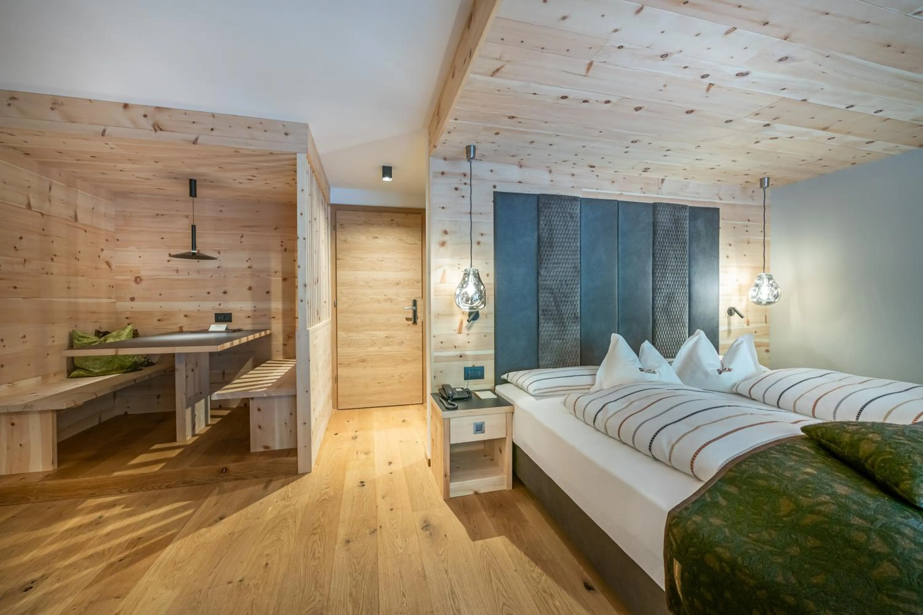 Bed in Hotel Cristallo - Wellness Mountain Living