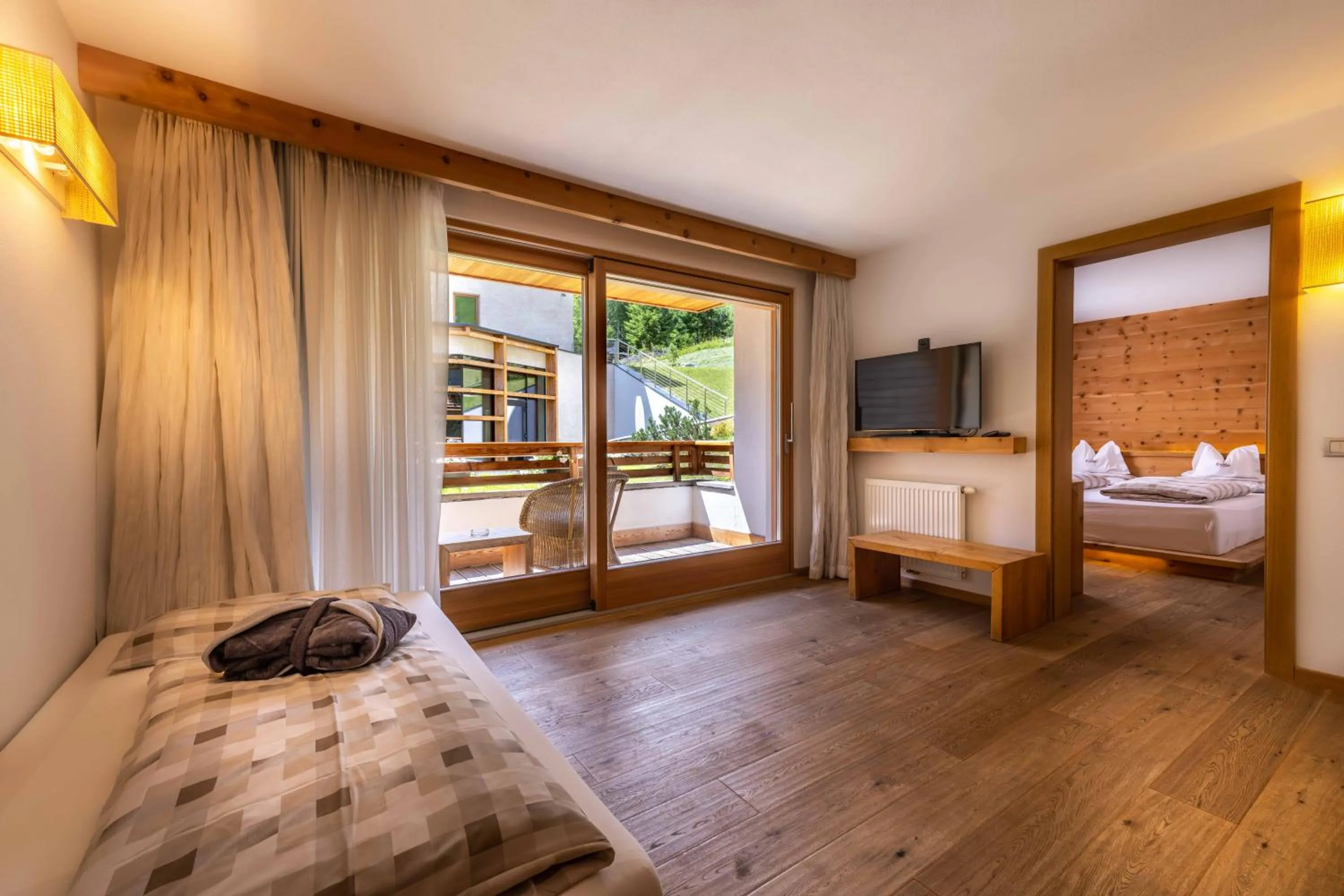 Bedroom, Bed in Hotel Cristallo - Wellness Mountain Living