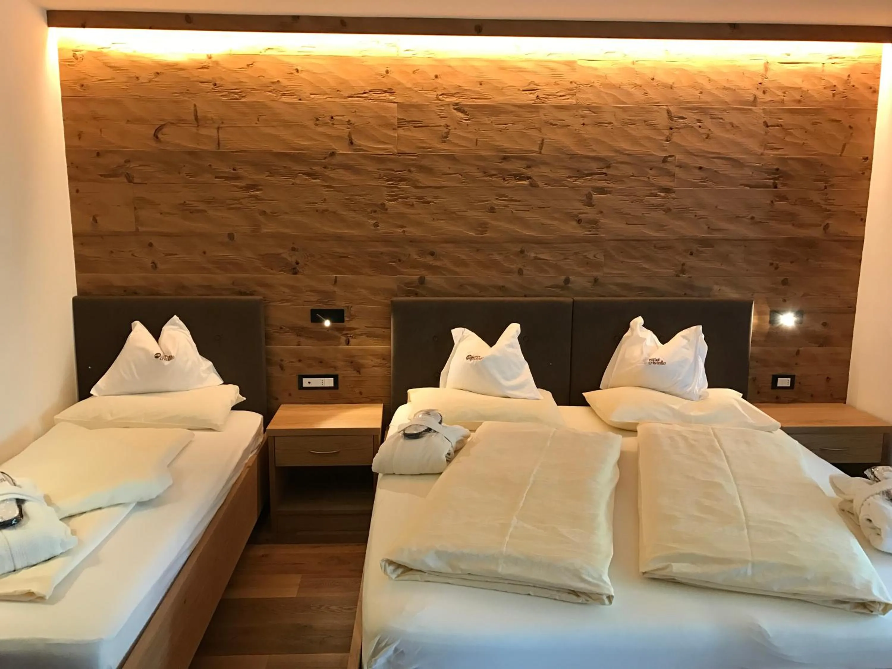 Bed in Hotel Cristallo - Wellness Mountain Living