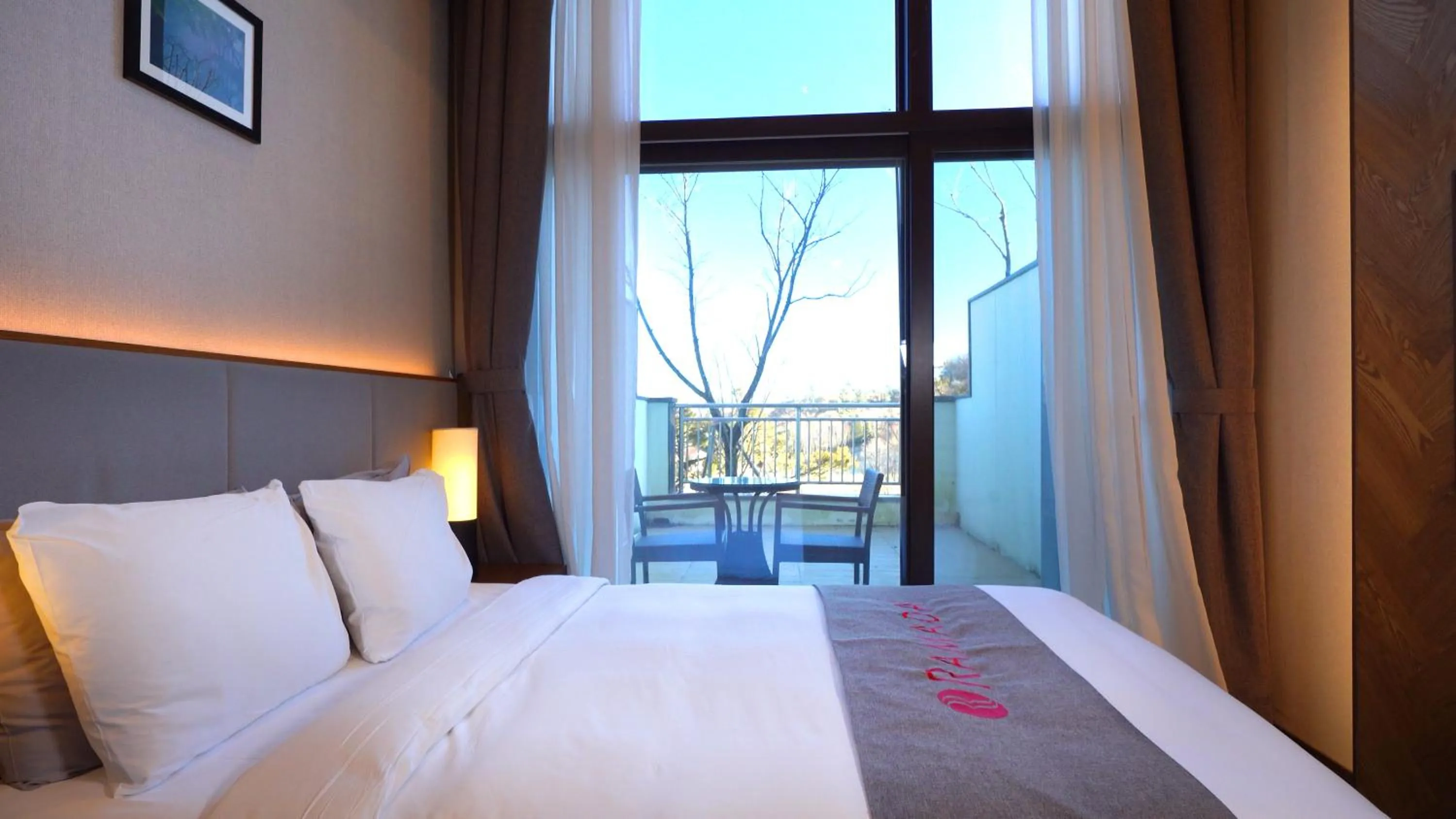 Photo of the whole room, Bed in Ramada Hotel & Suite by Wyndham Gangwon Pyeongchang