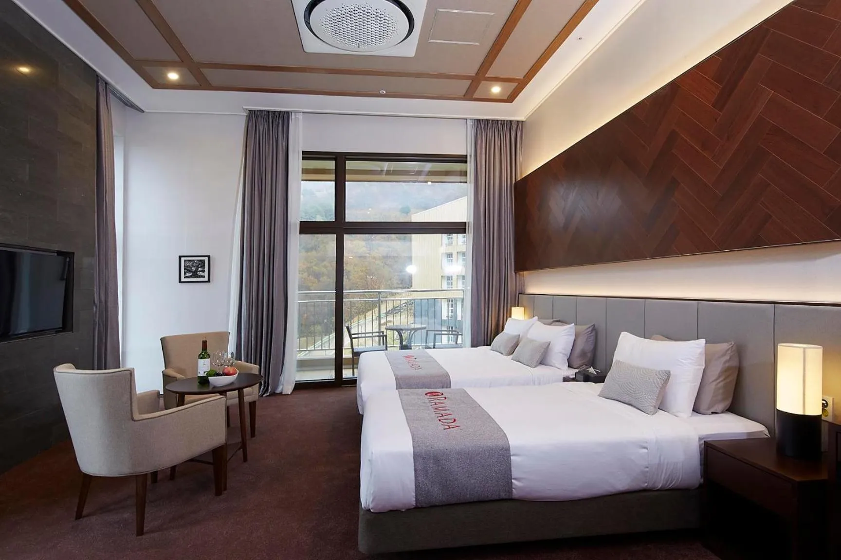 Photo of the whole room, Bed in Ramada Hotel & Suite by Wyndham Gangwon Pyeongchang