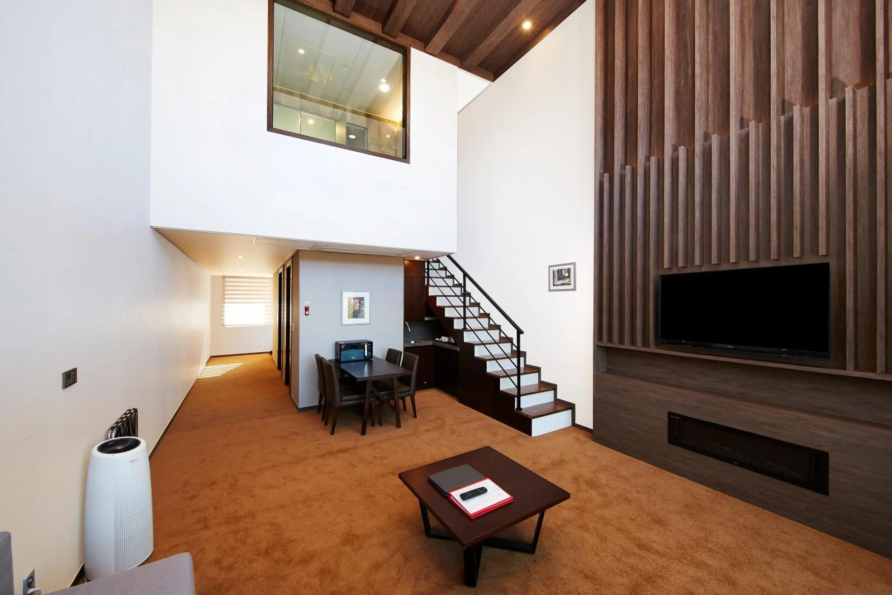 Living room in Ramada Hotel & Suite by Wyndham Gangwon Pyeongchang