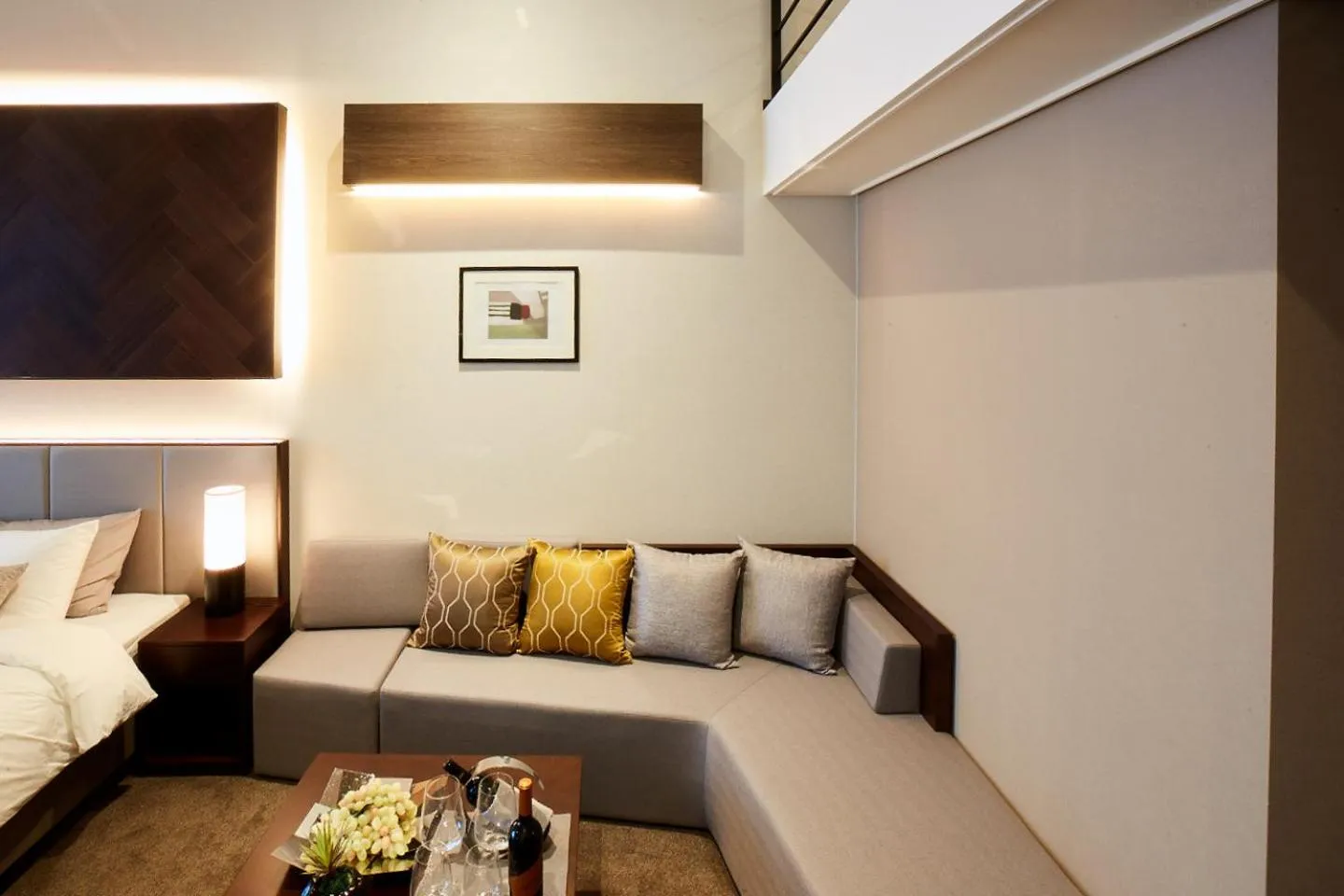 Living room, Bed in Ramada Hotel & Suite by Wyndham Gangwon Pyeongchang