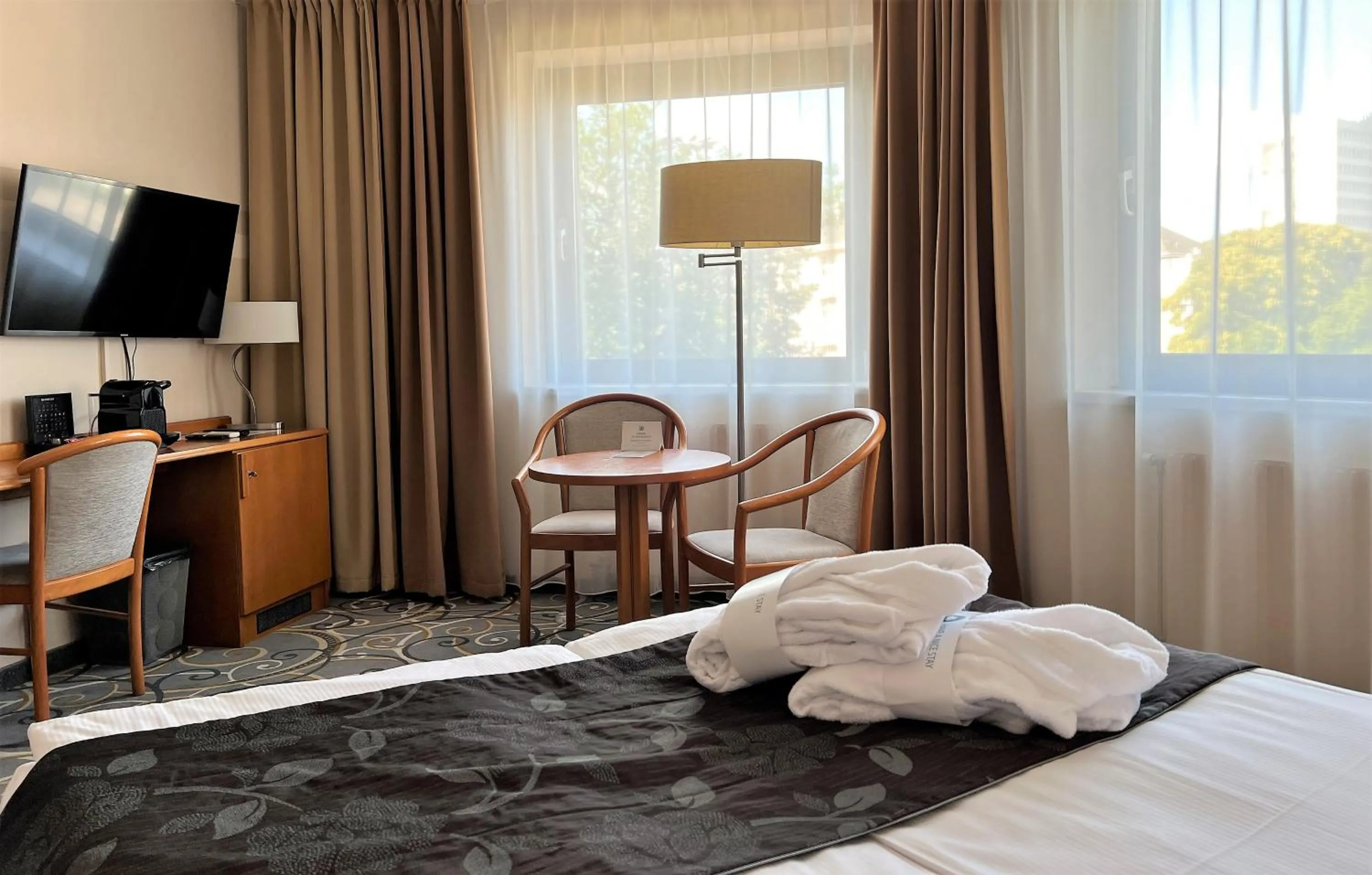 Photo of the whole room, Bed in City Hotel