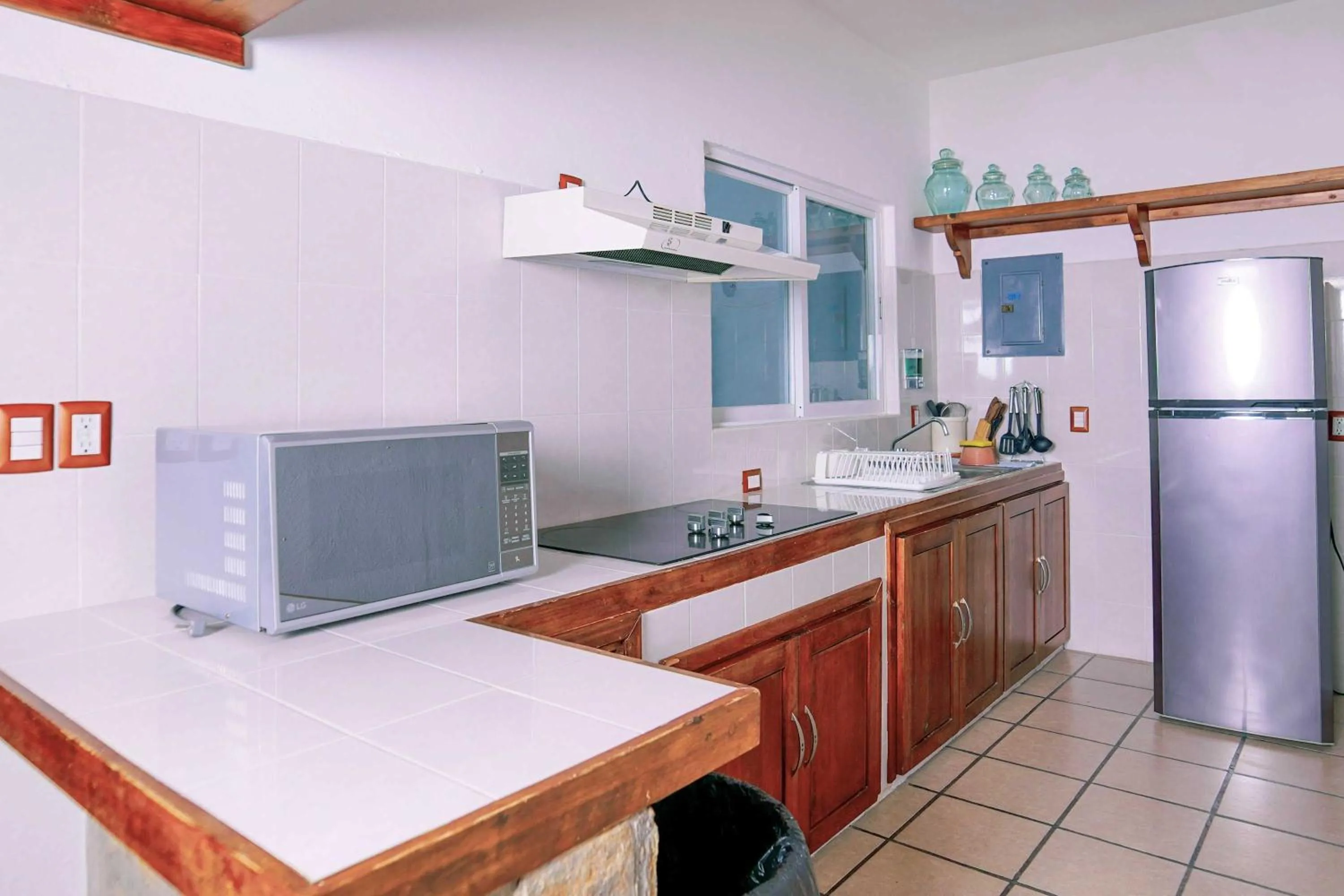 Kitchen or kitchenette in Villas & Resort Luz de Luna