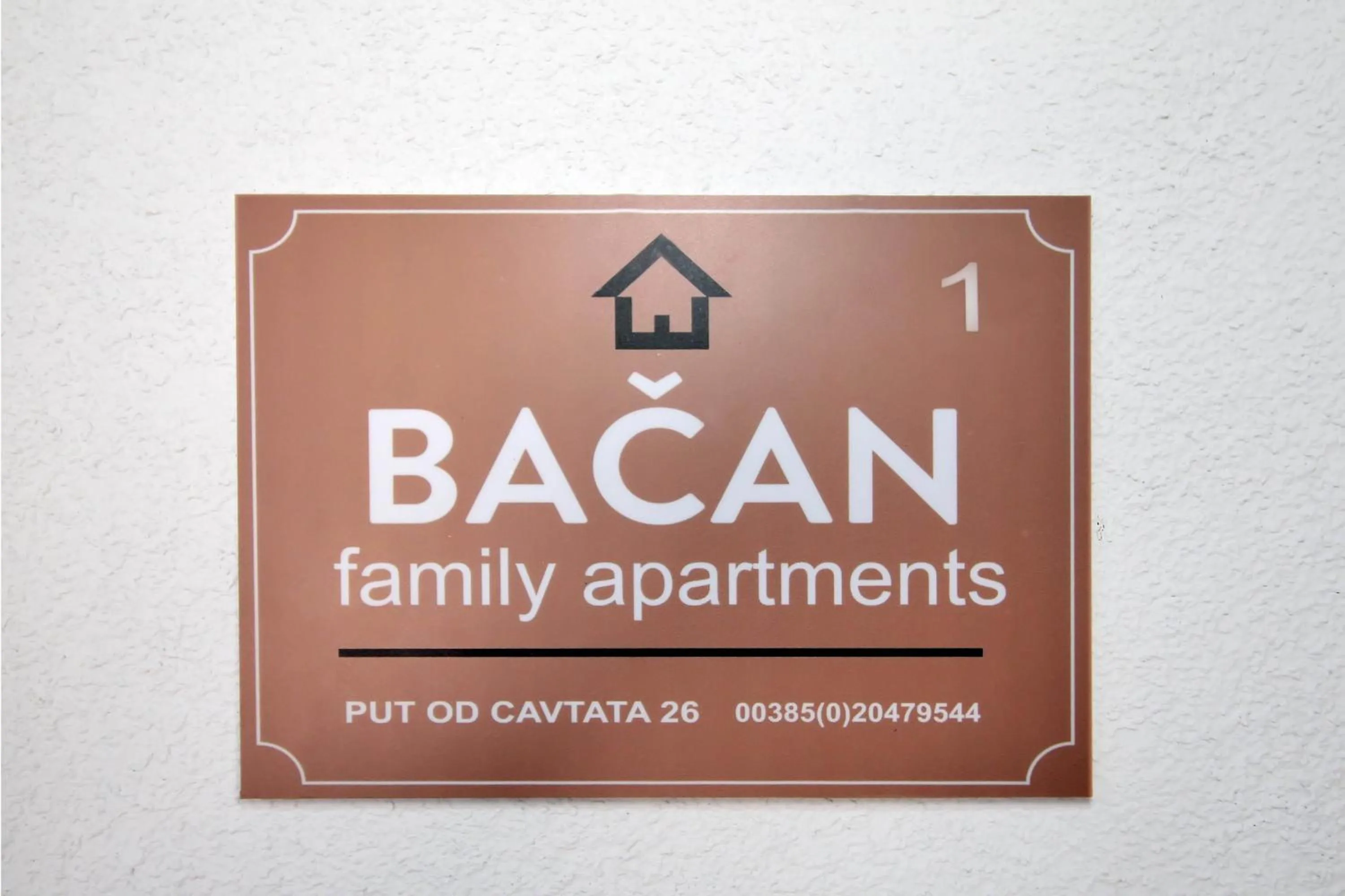 Property logo or sign in Bacan Family Apartments