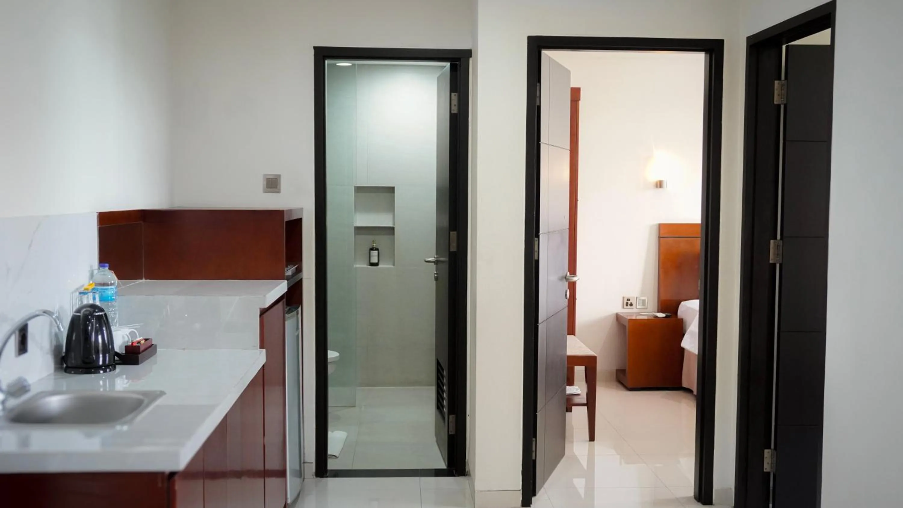 Property building, Bed in Grand Kuta Hotel and Residence