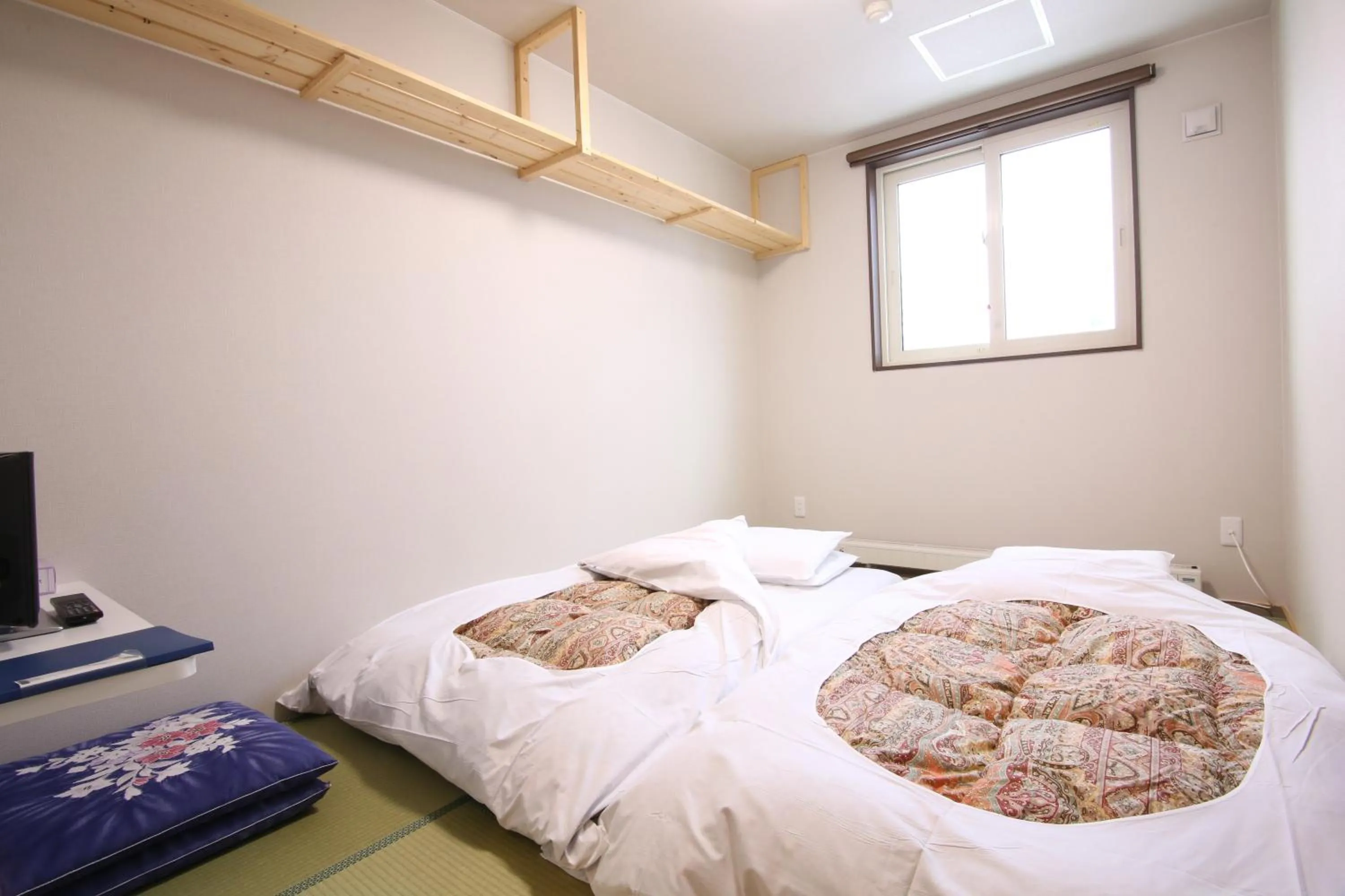 Bed in Lodge Koropokkuru