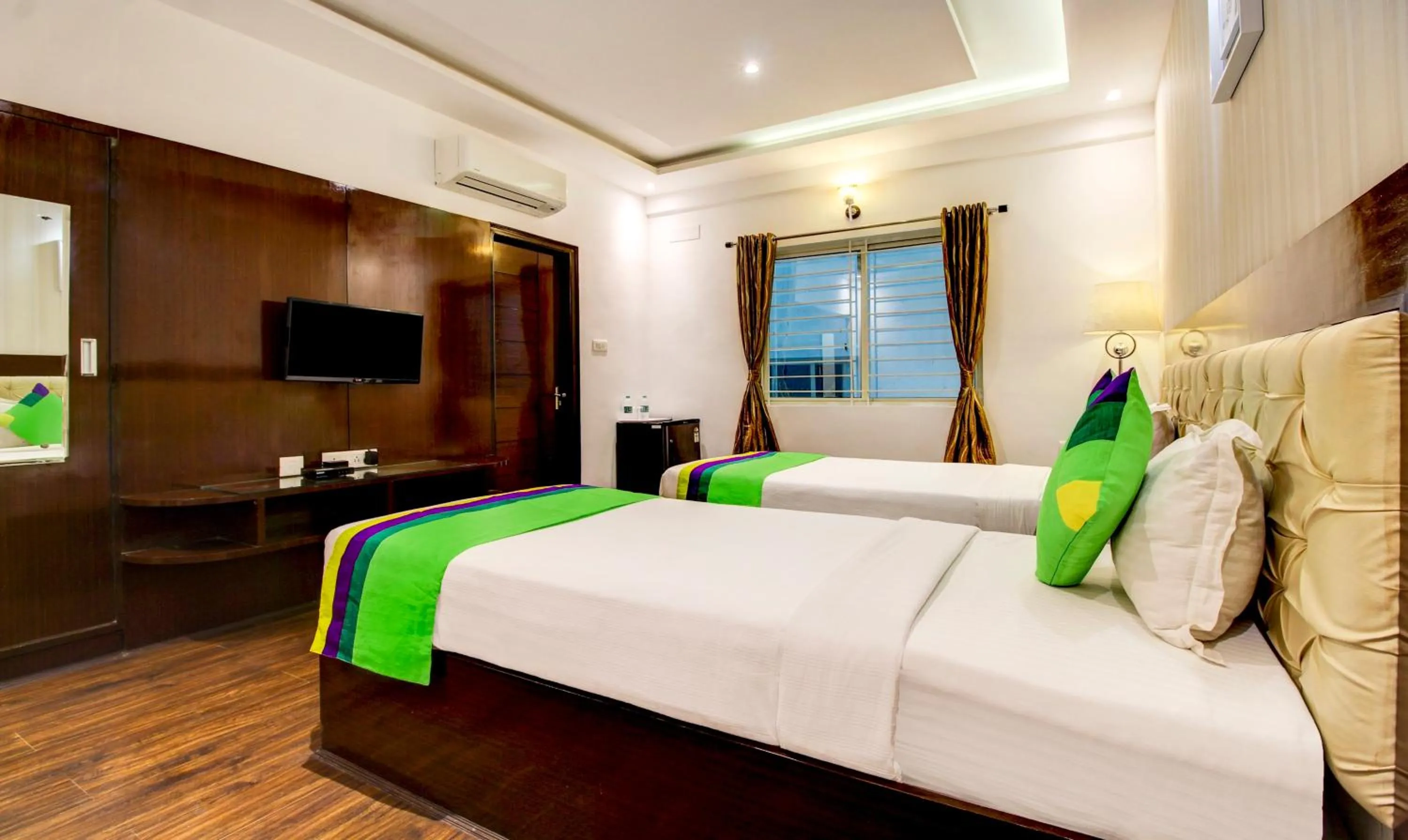 Bedroom, Bed in Treebo The Sai Leela Suites