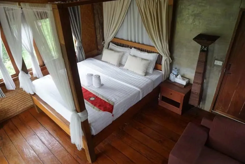 Bed in Vimarnkiri Resort