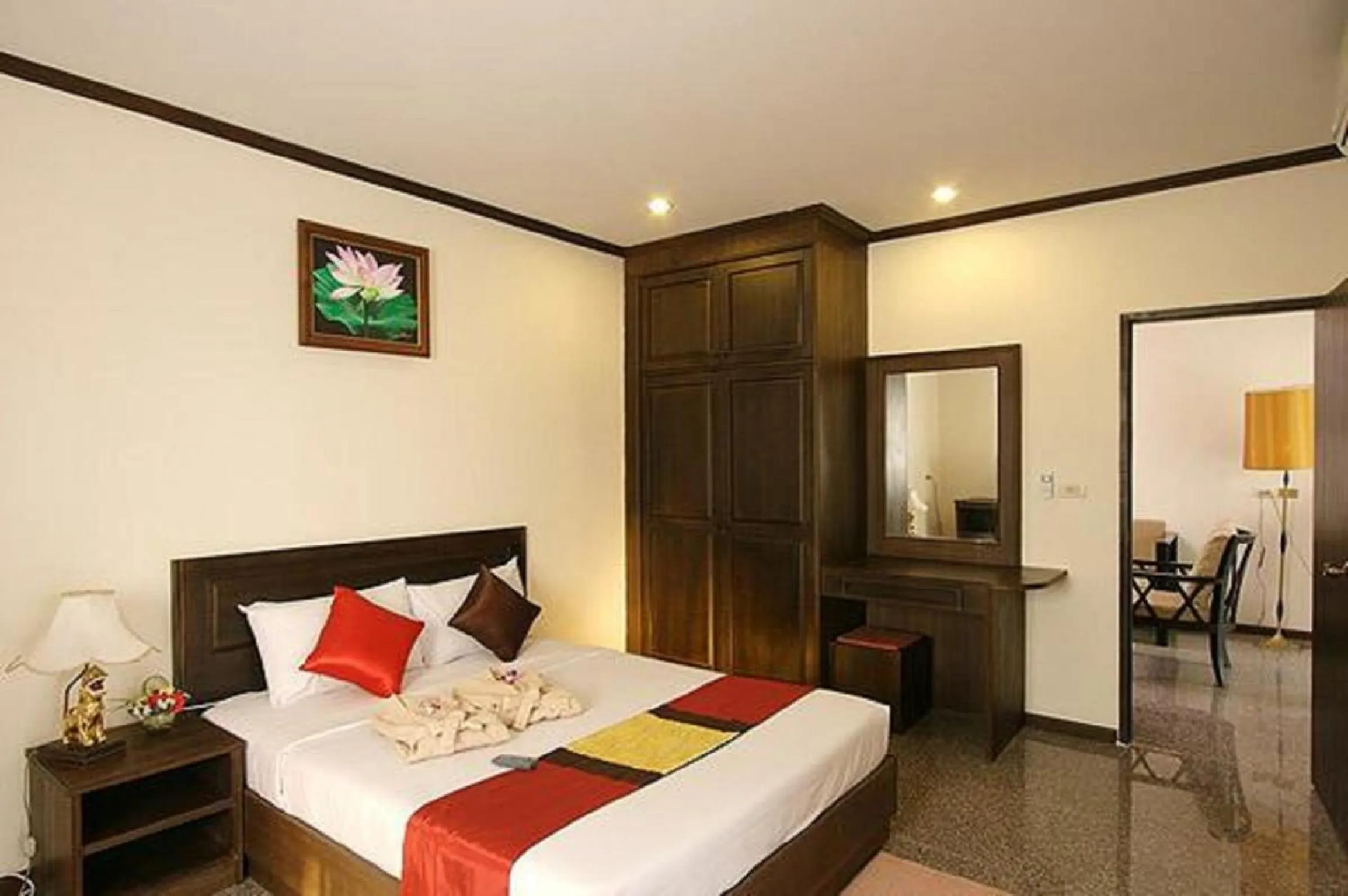 Bed in Royal Panerai Hotel Chiangmai