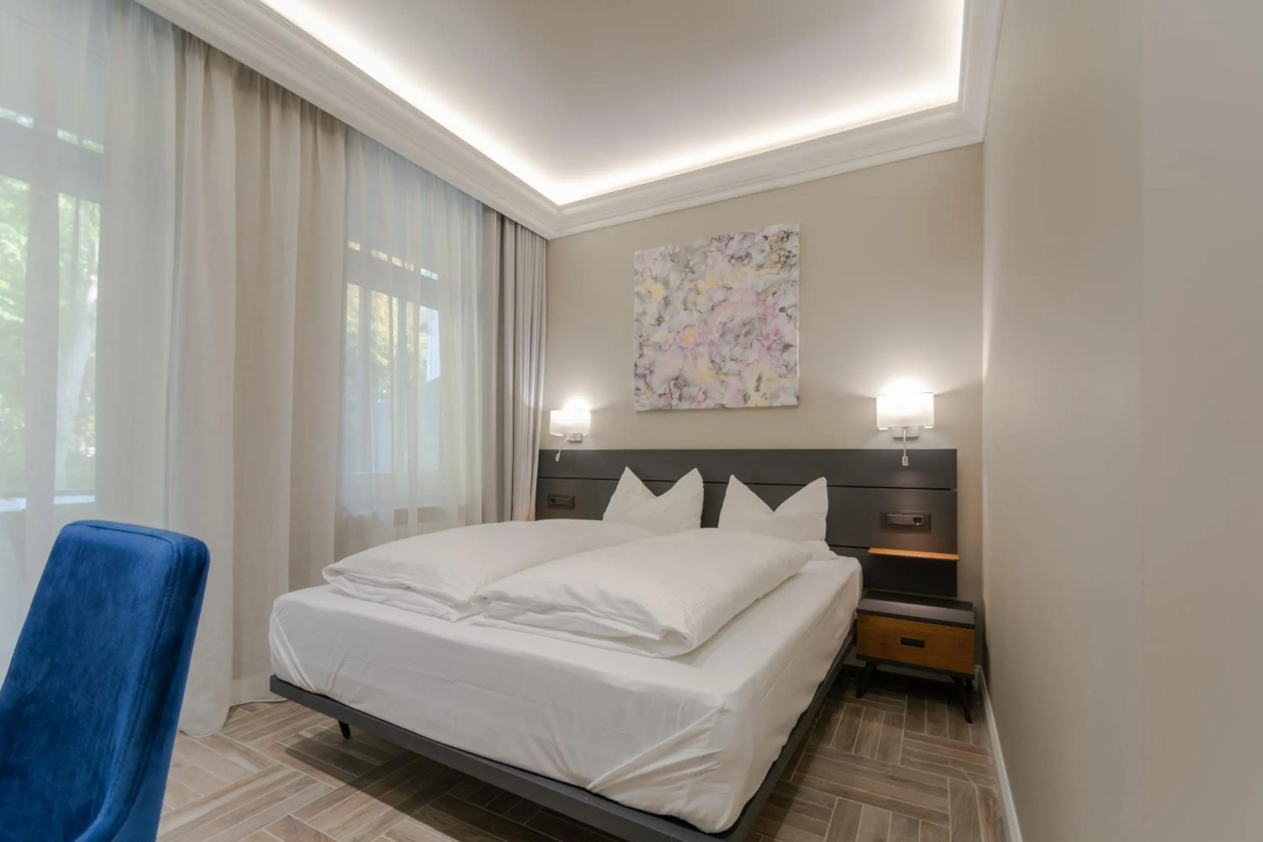 Bed in 2H Horizon Hotel