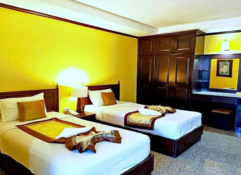 Bed in Royal Peninsula Hotel Chiangmai