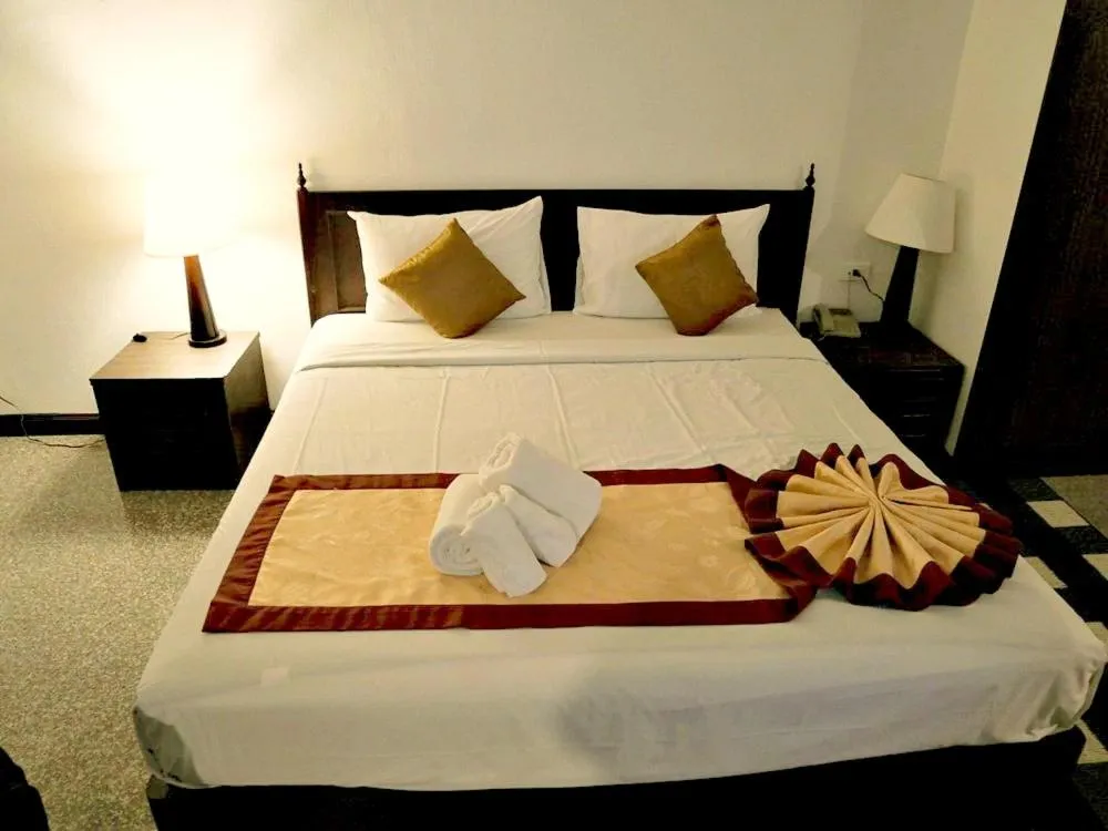 Bed in Royal Peninsula Hotel Chiangmai