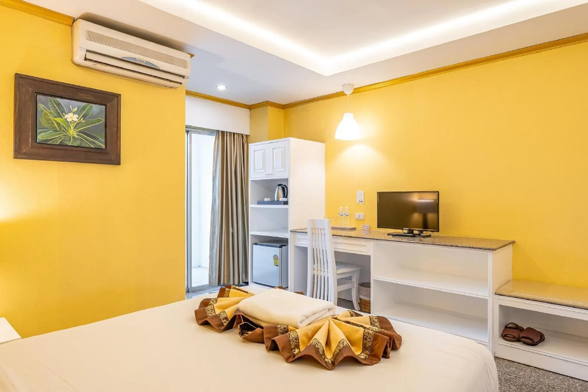 Bed in Royal Peninsula Hotel Chiangmai