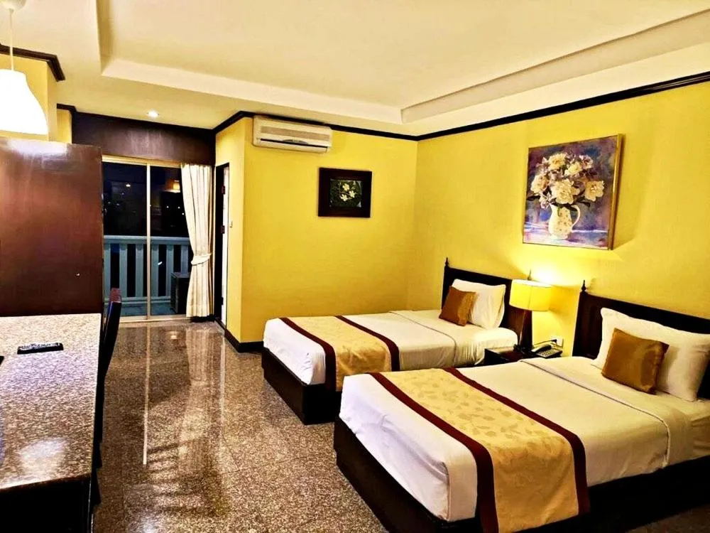 Bed in Royal Peninsula Hotel Chiangmai