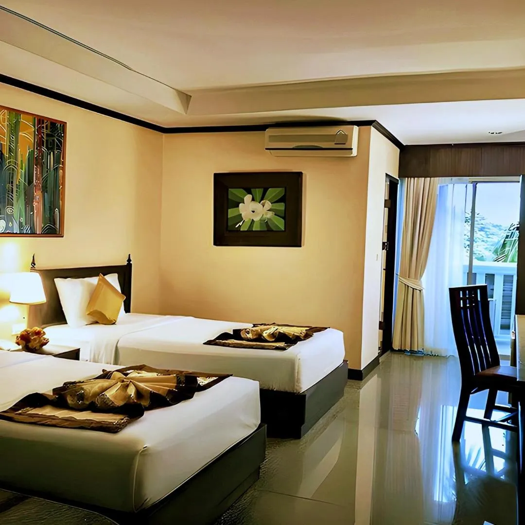 Bed in Royal Peninsula Hotel Chiangmai