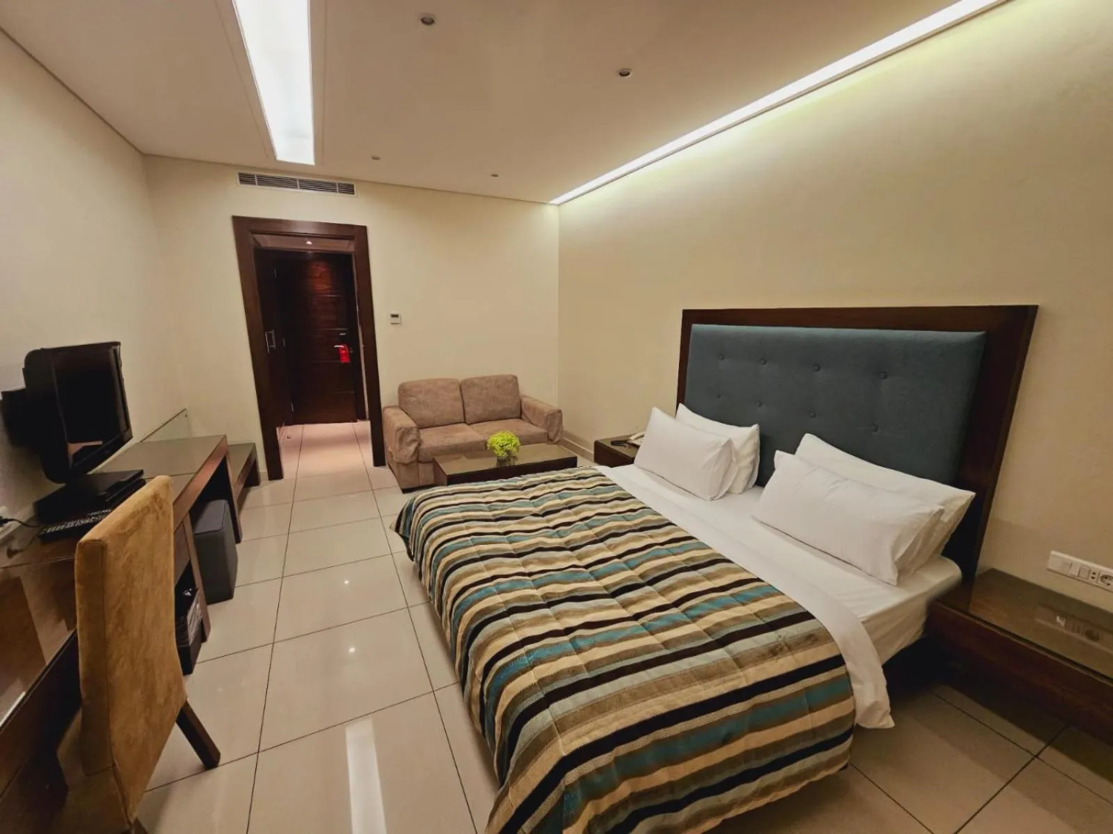 Bed in Verdun Suites Hotel