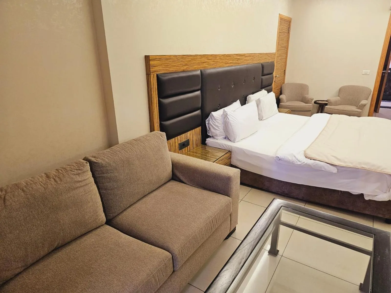 Bed in Verdun Suites Hotel