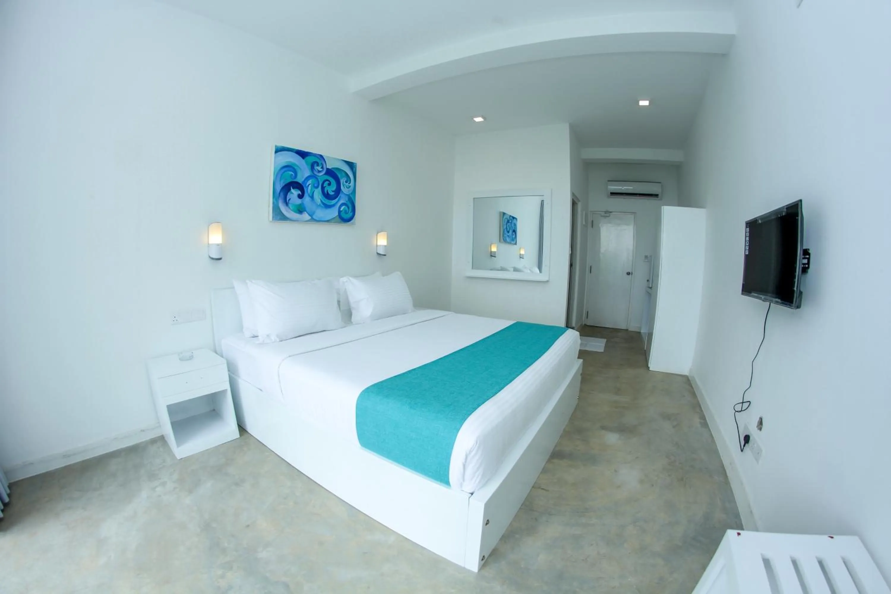 Bed in Somerset Mirissa Beach