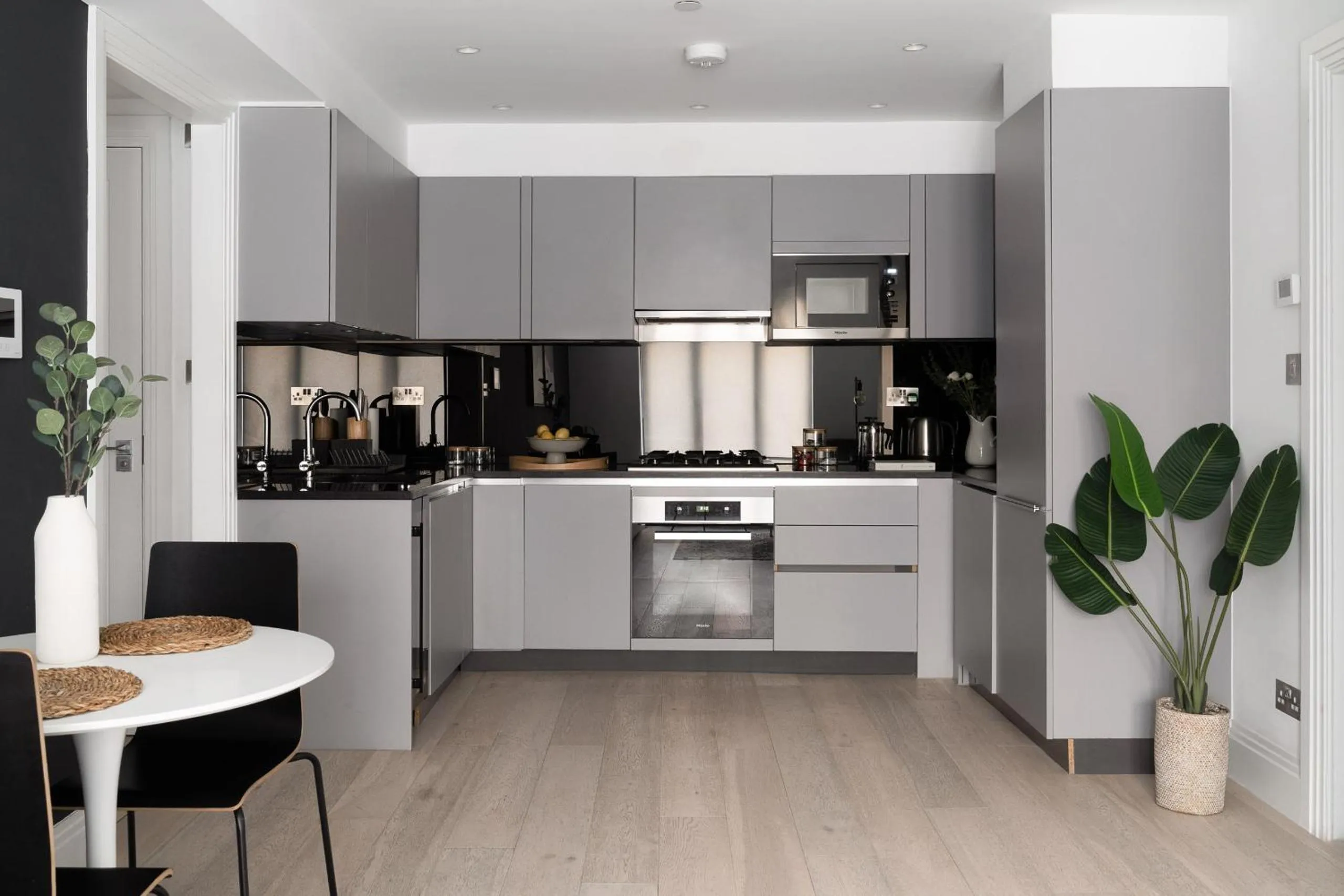 Kitchen or kitchenette in Oxford Circus Apartments by Calton Living