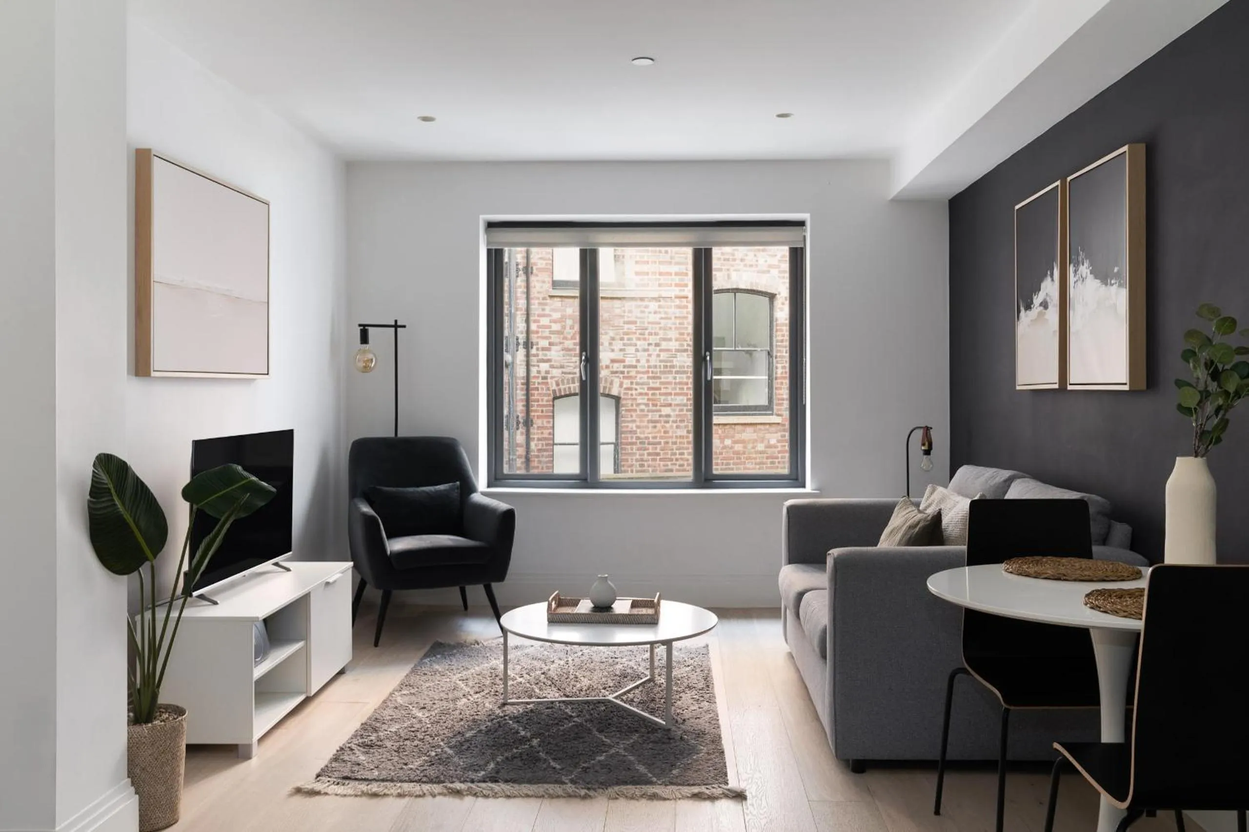 Living room in Oxford Circus Apartments by Calton Living