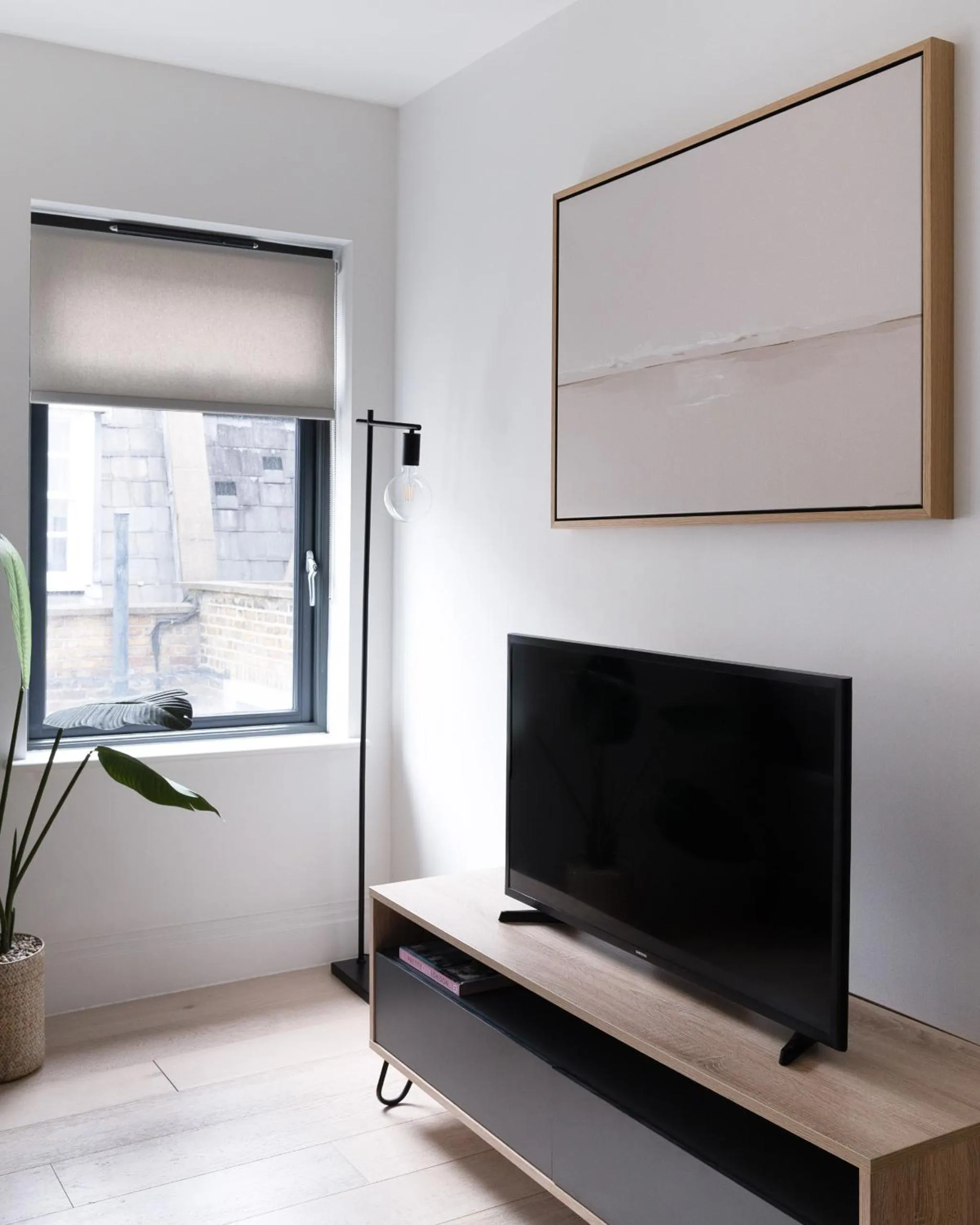 TV and multimedia in Oxford Circus Apartments by Calton Living