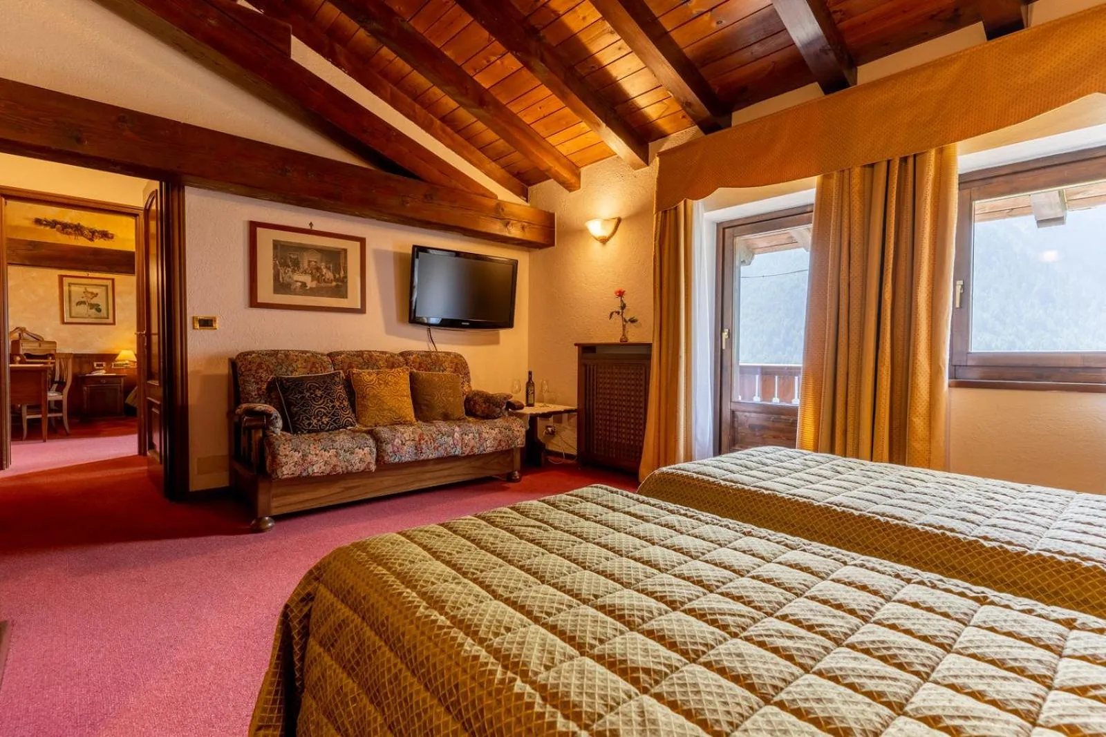 Living room, Bed in Hotel Des Alpes