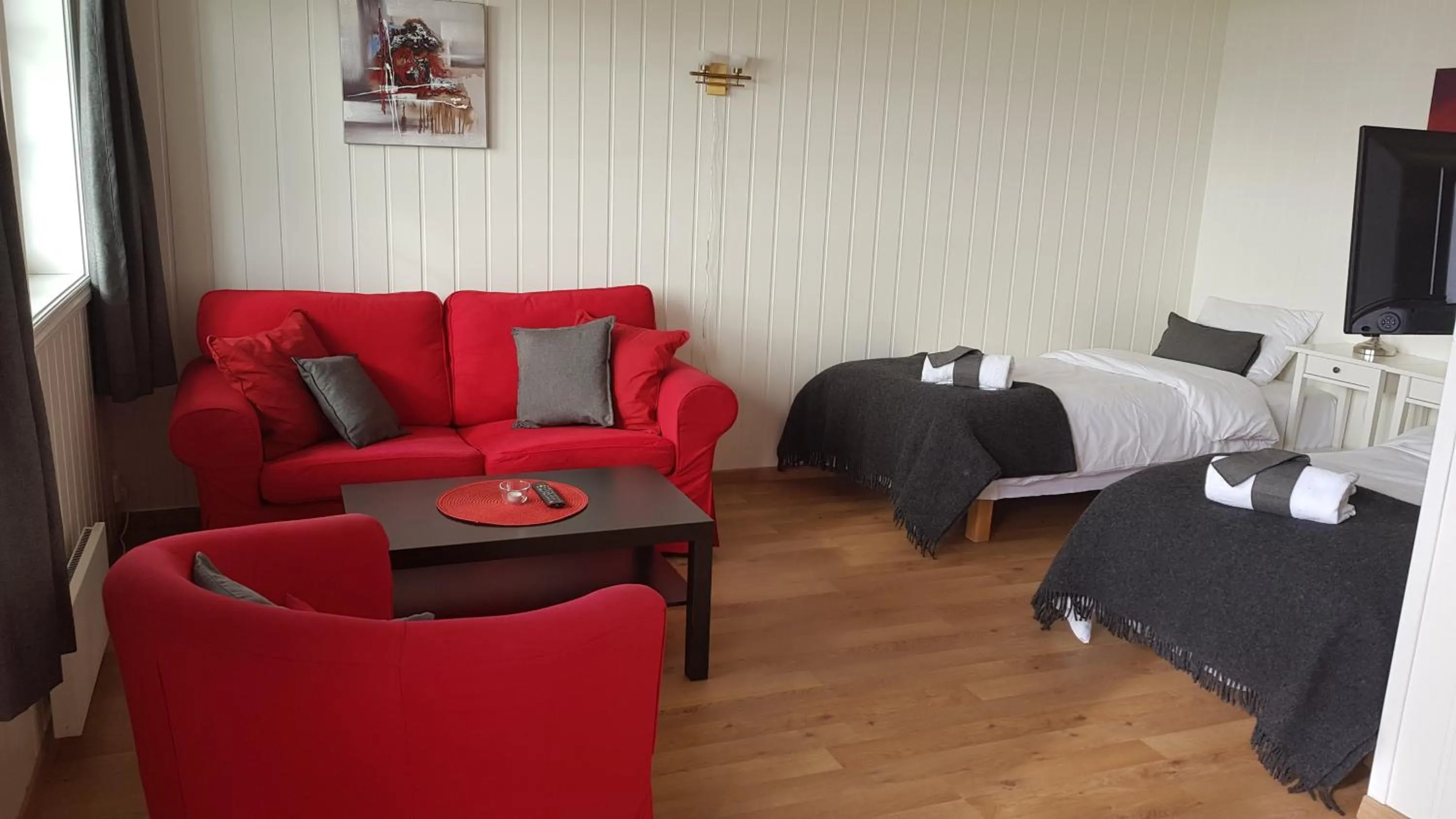 Seating area, Bed in Storestølen Fjellhotell