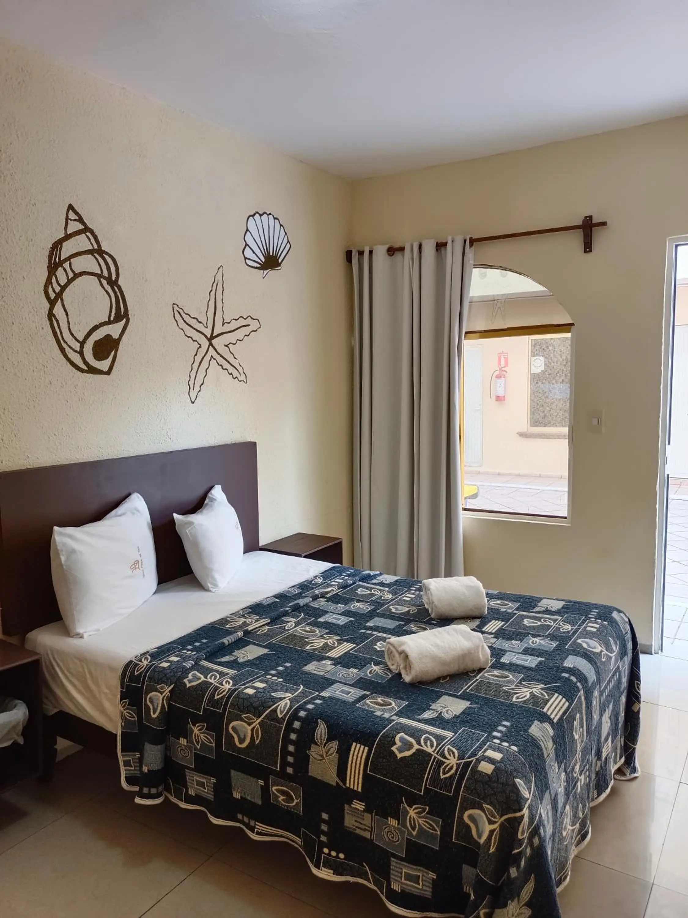 Photo of the whole room, Bed in Hotel Playa de Oro - Enfrente de WTC y Plazas Comerciales