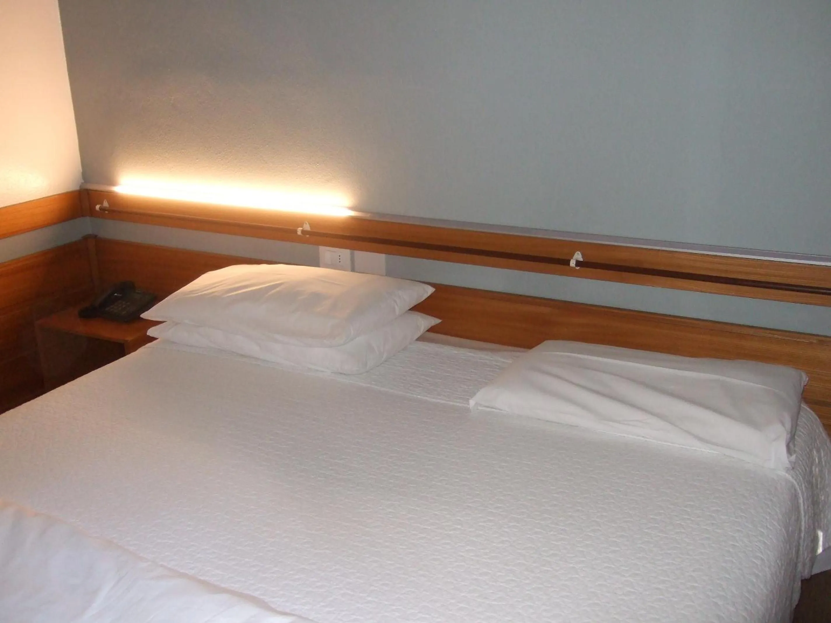 Bed in Hotel Canturio