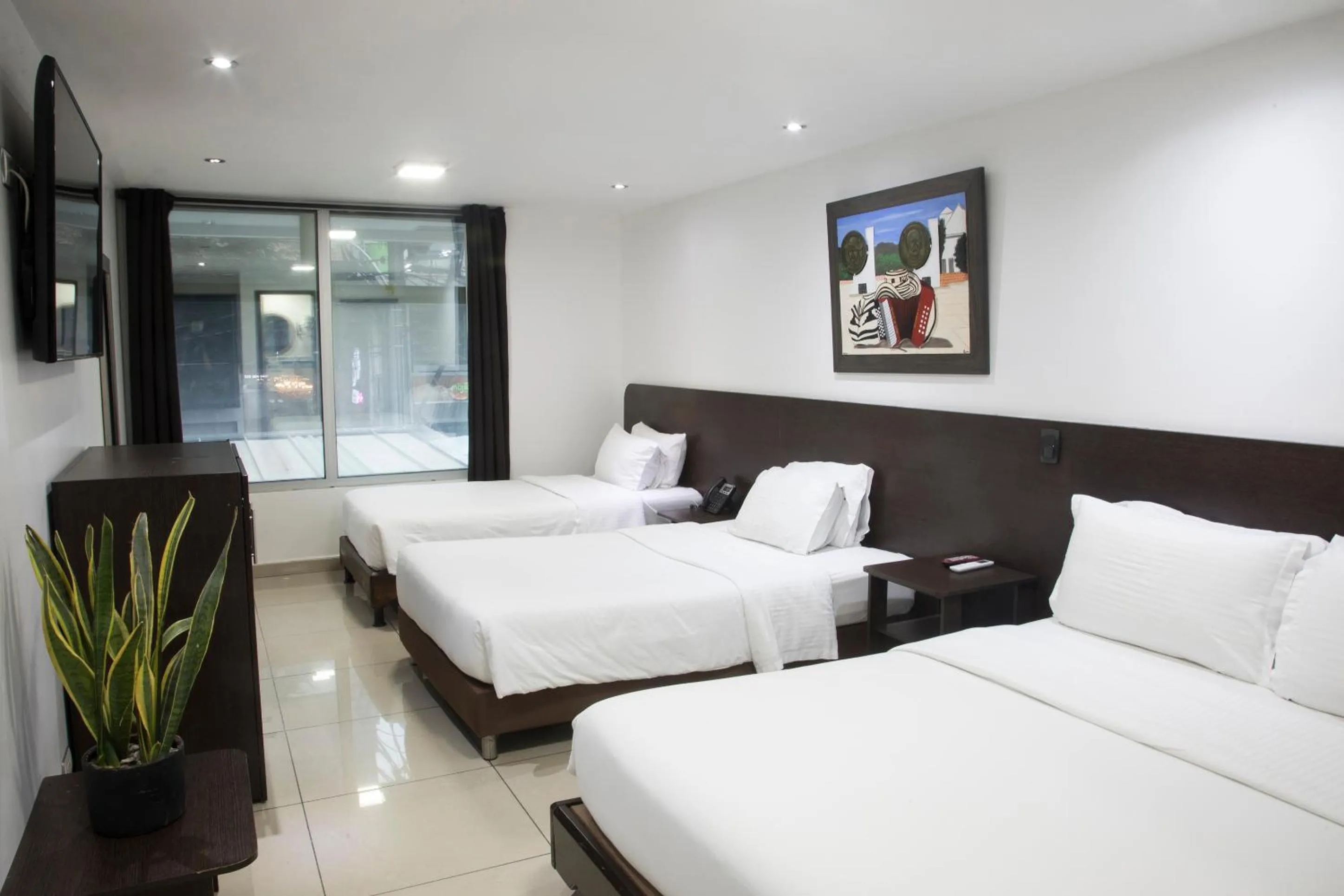 Standard Triple Room in Hotel Acqua Medellín