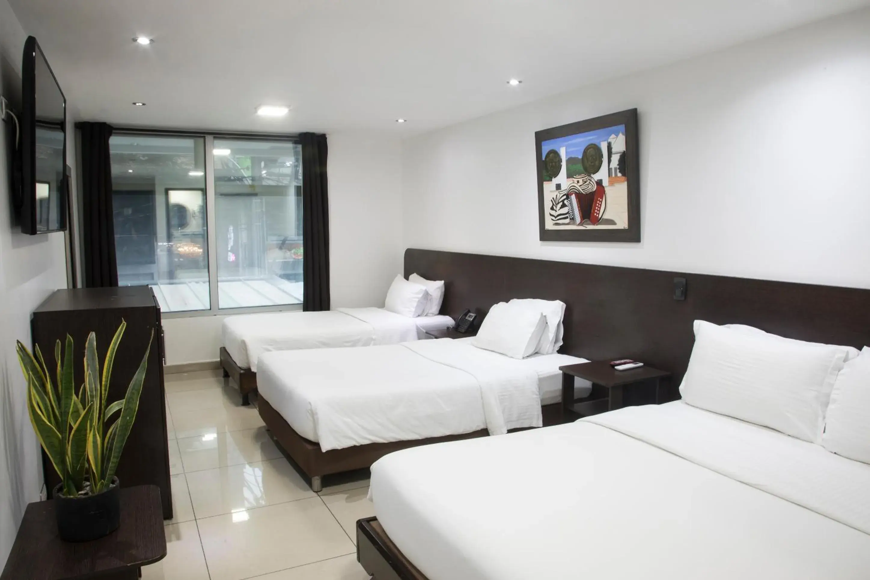 Standard Triple Room in Hotel Acqua Medellín Standard Triple Room in Hotel Acqua Medellín