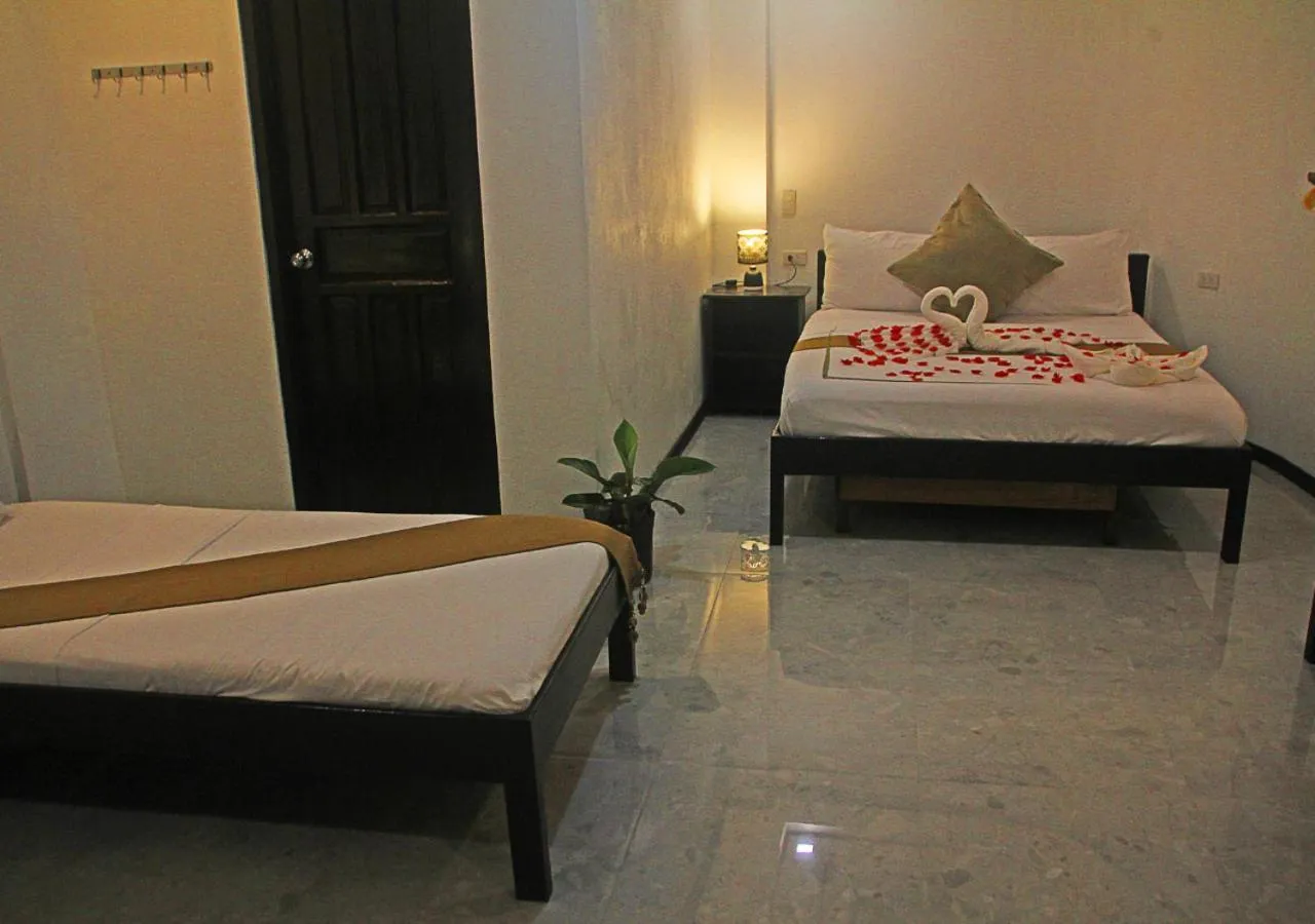 Bedroom, Bed in Hotel Oasis Port Barton