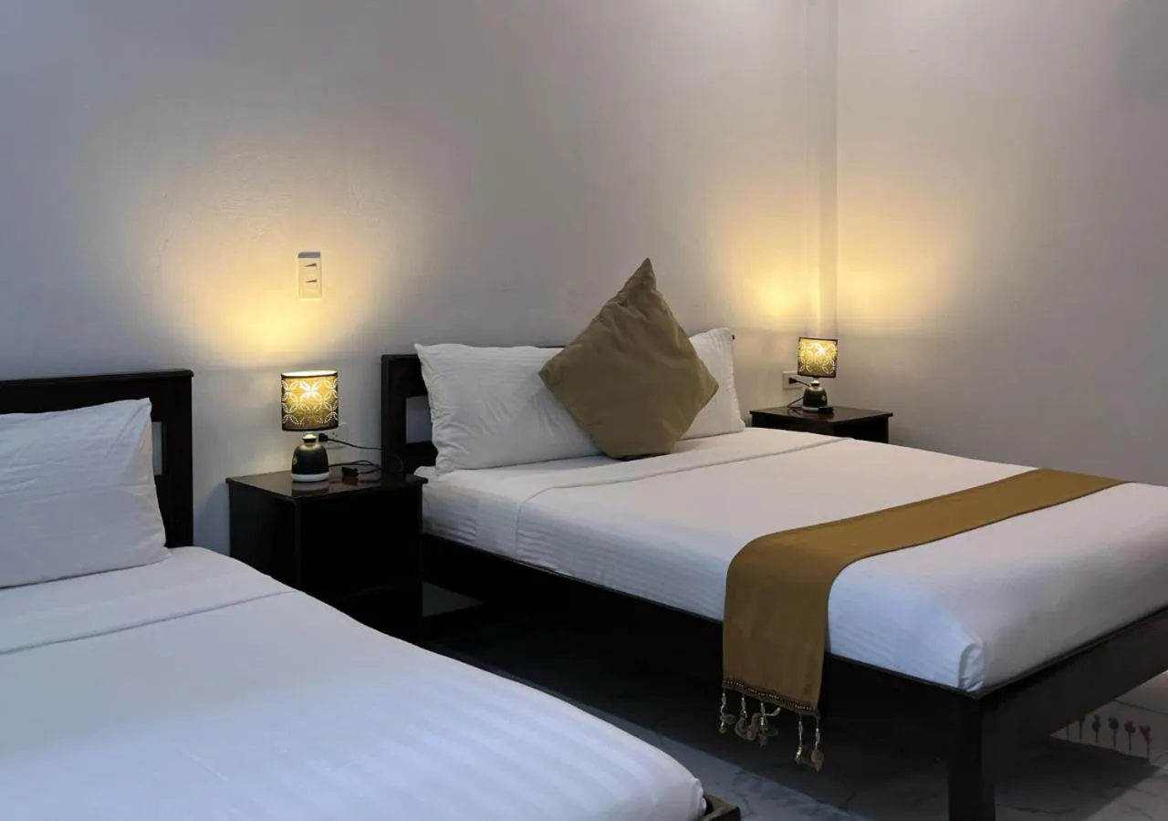 Bed in Hotel Oasis Port Barton