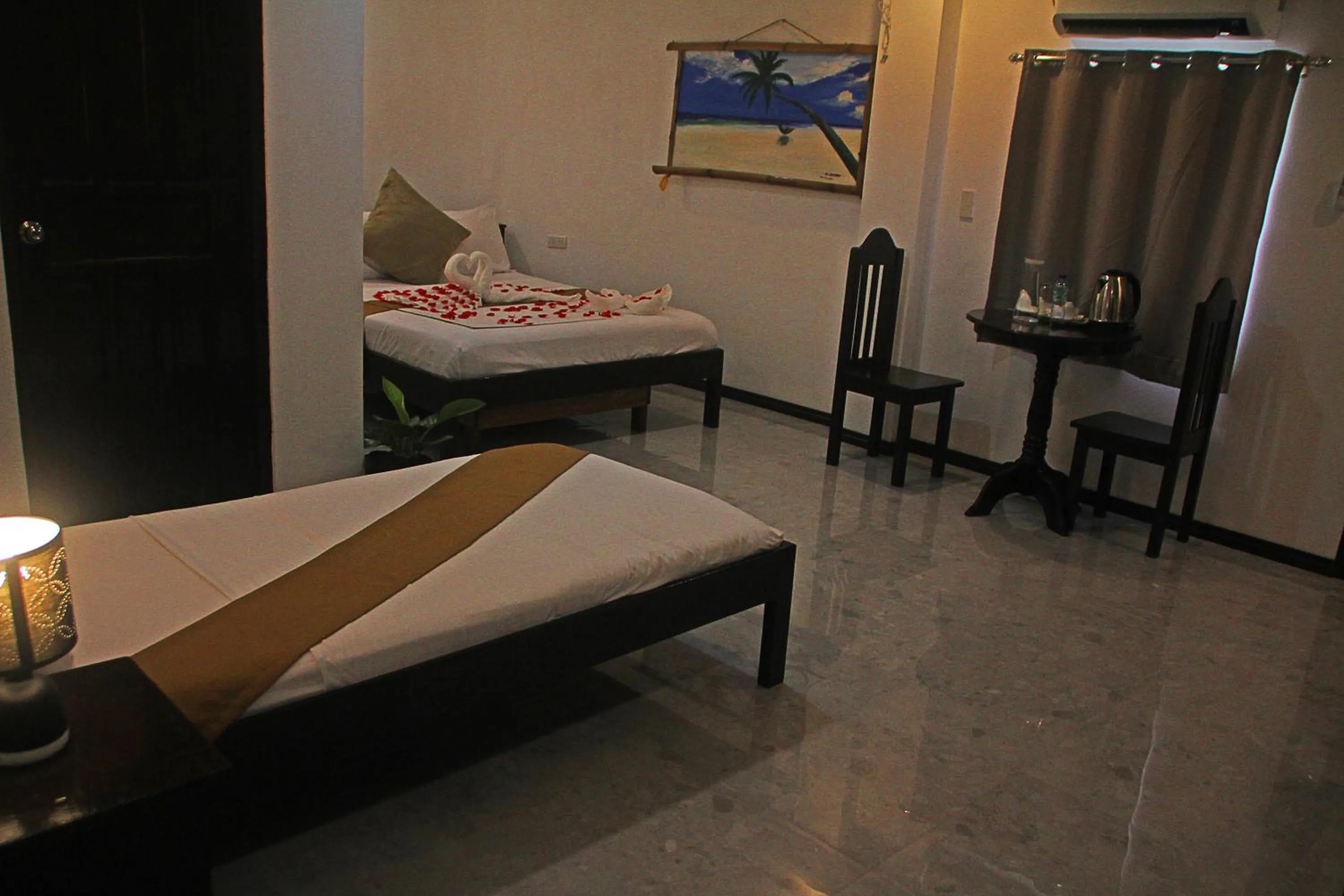 Bed in Hotel Oasis Port Barton