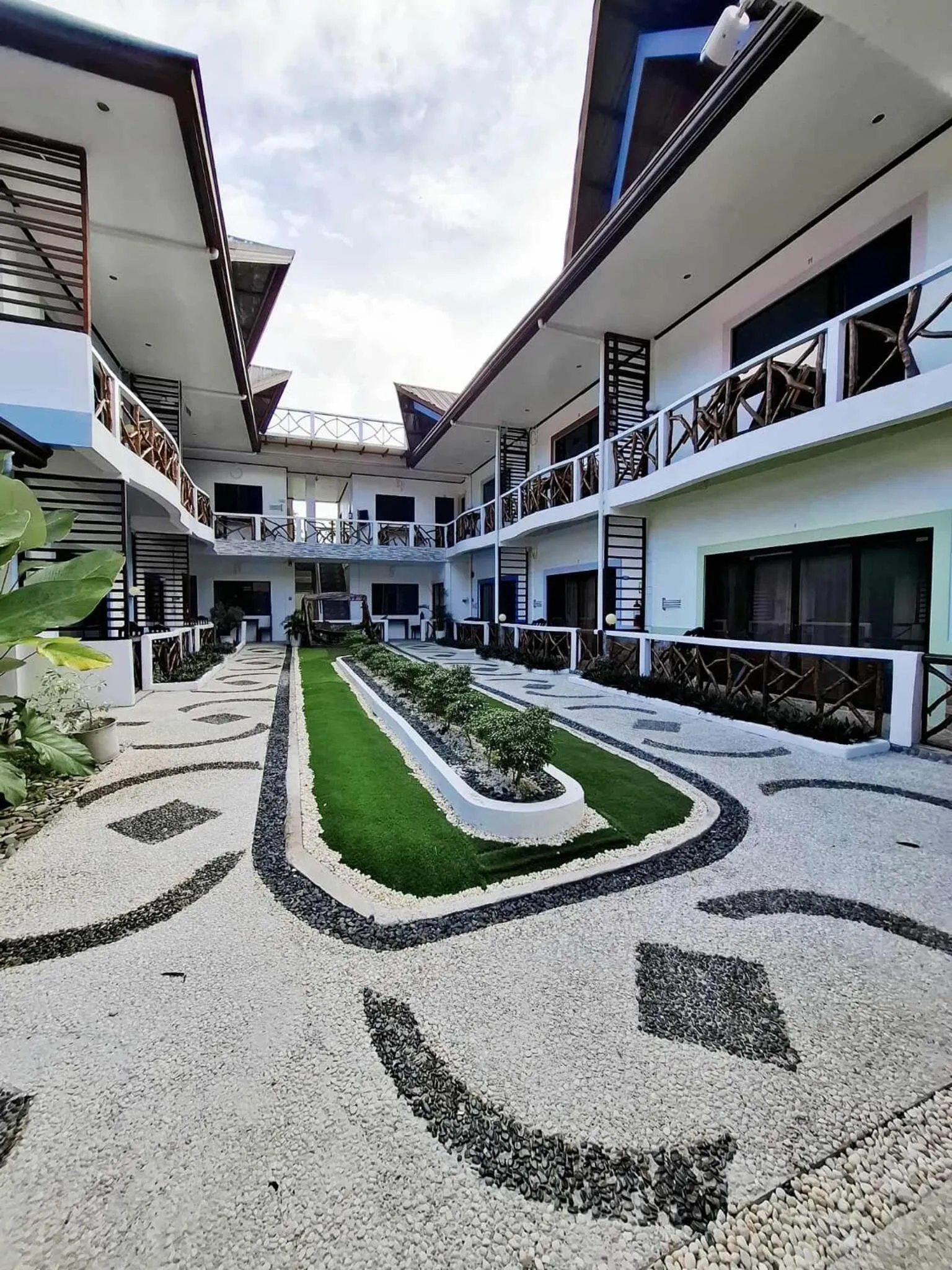 Property building in Hotel Oasis Port Barton