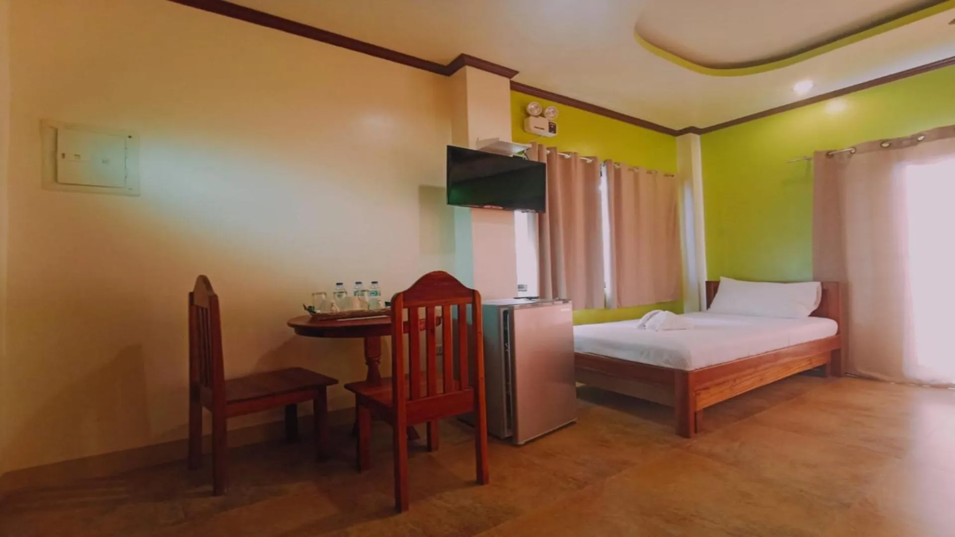 Bed in Hotel Oasis Port Barton