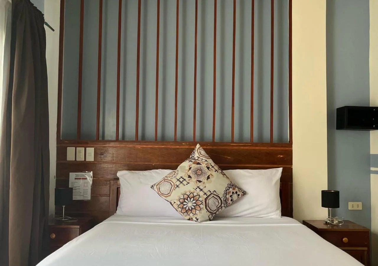 Bed in Hotel Oasis Port Barton