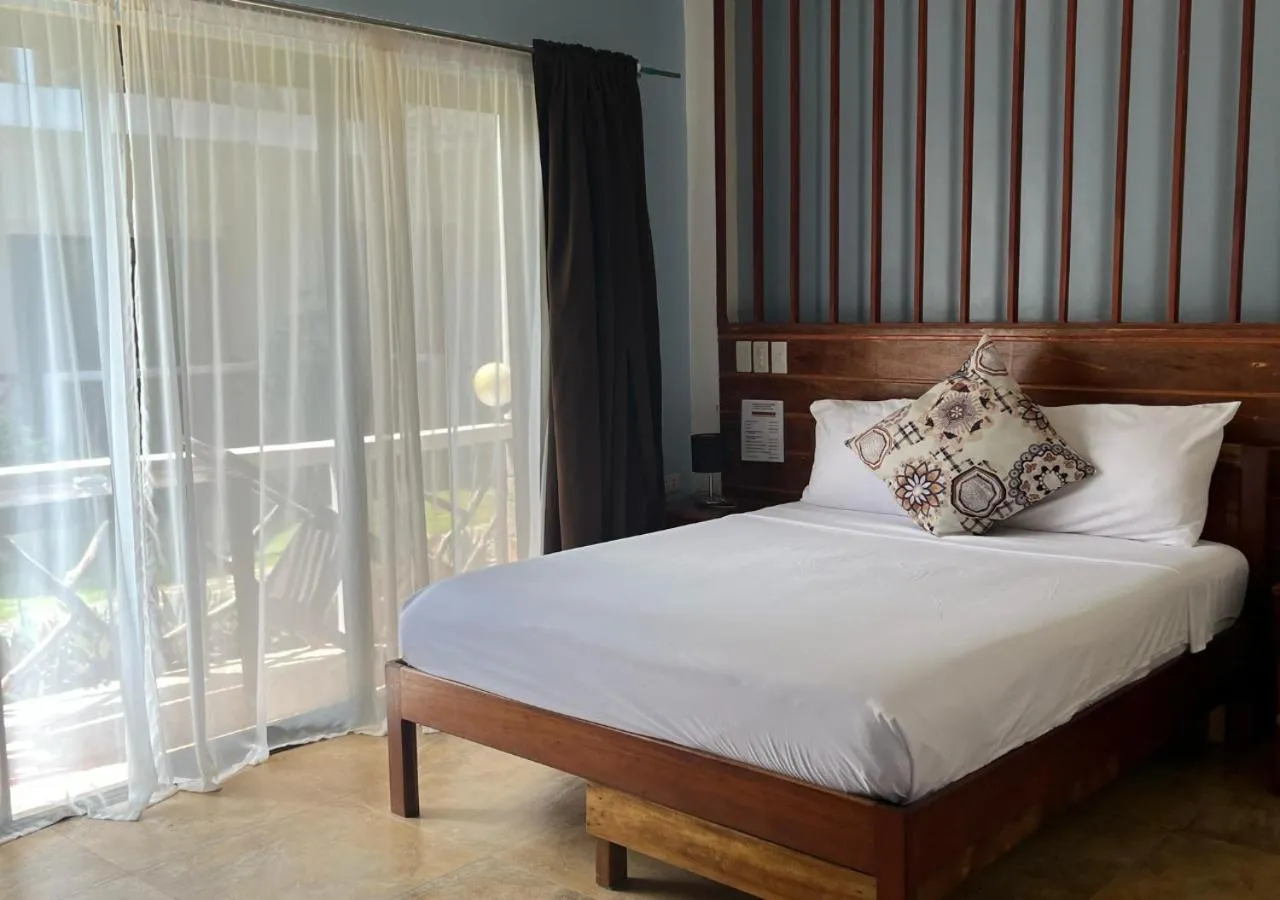 Bed in Hotel Oasis Port Barton