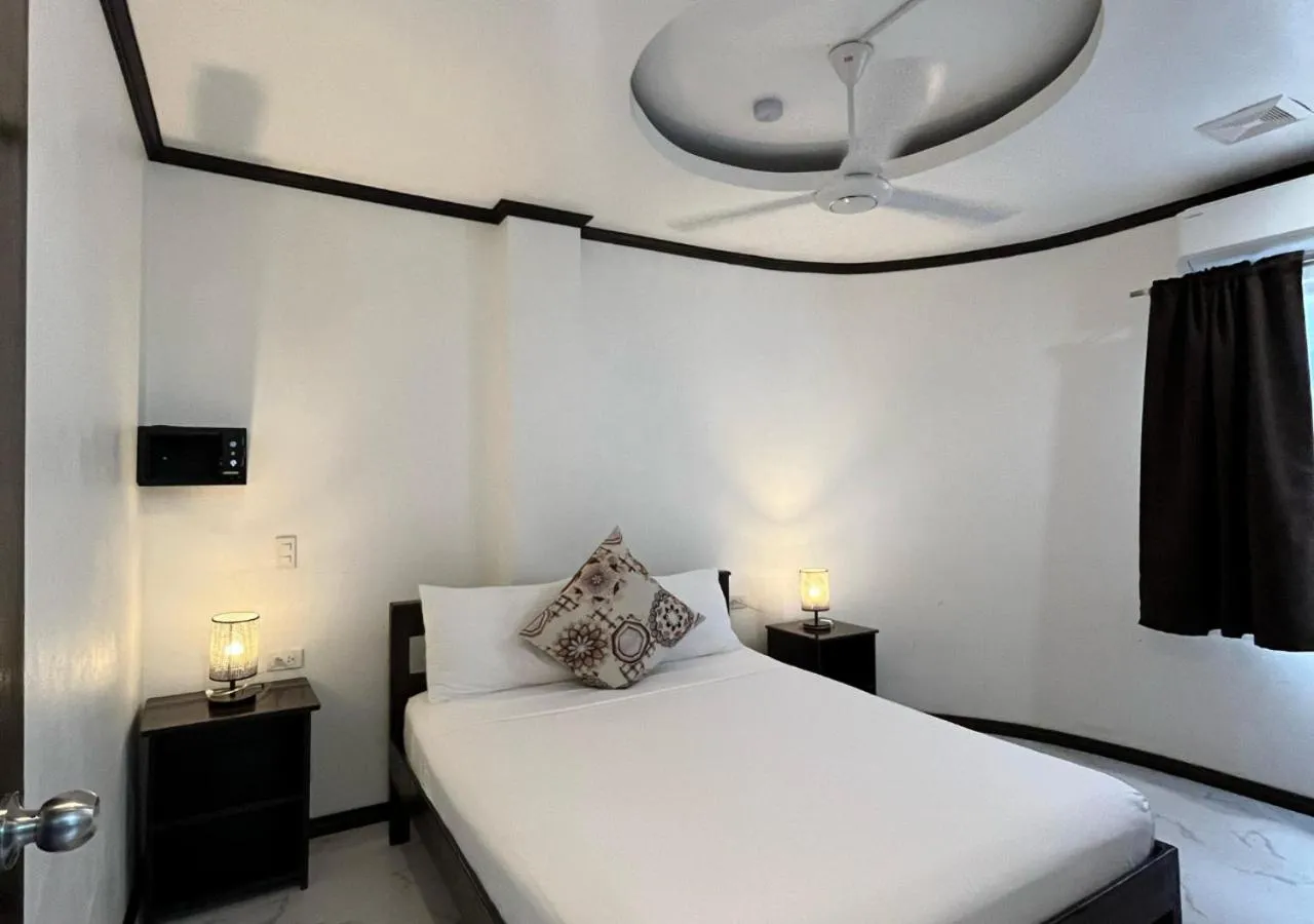 Bed in Hotel Oasis Port Barton