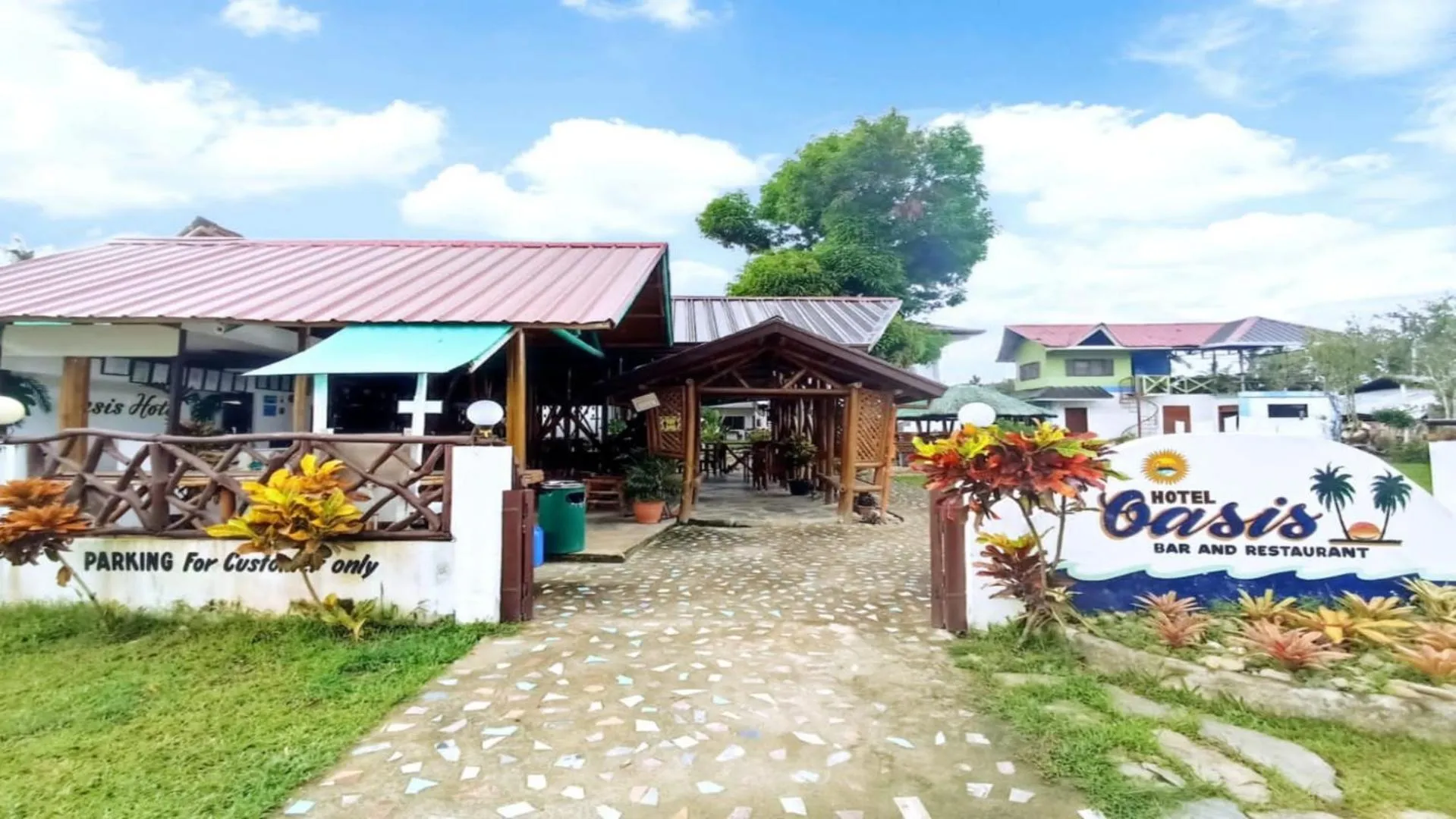 Property building in Hotel Oasis Port Barton