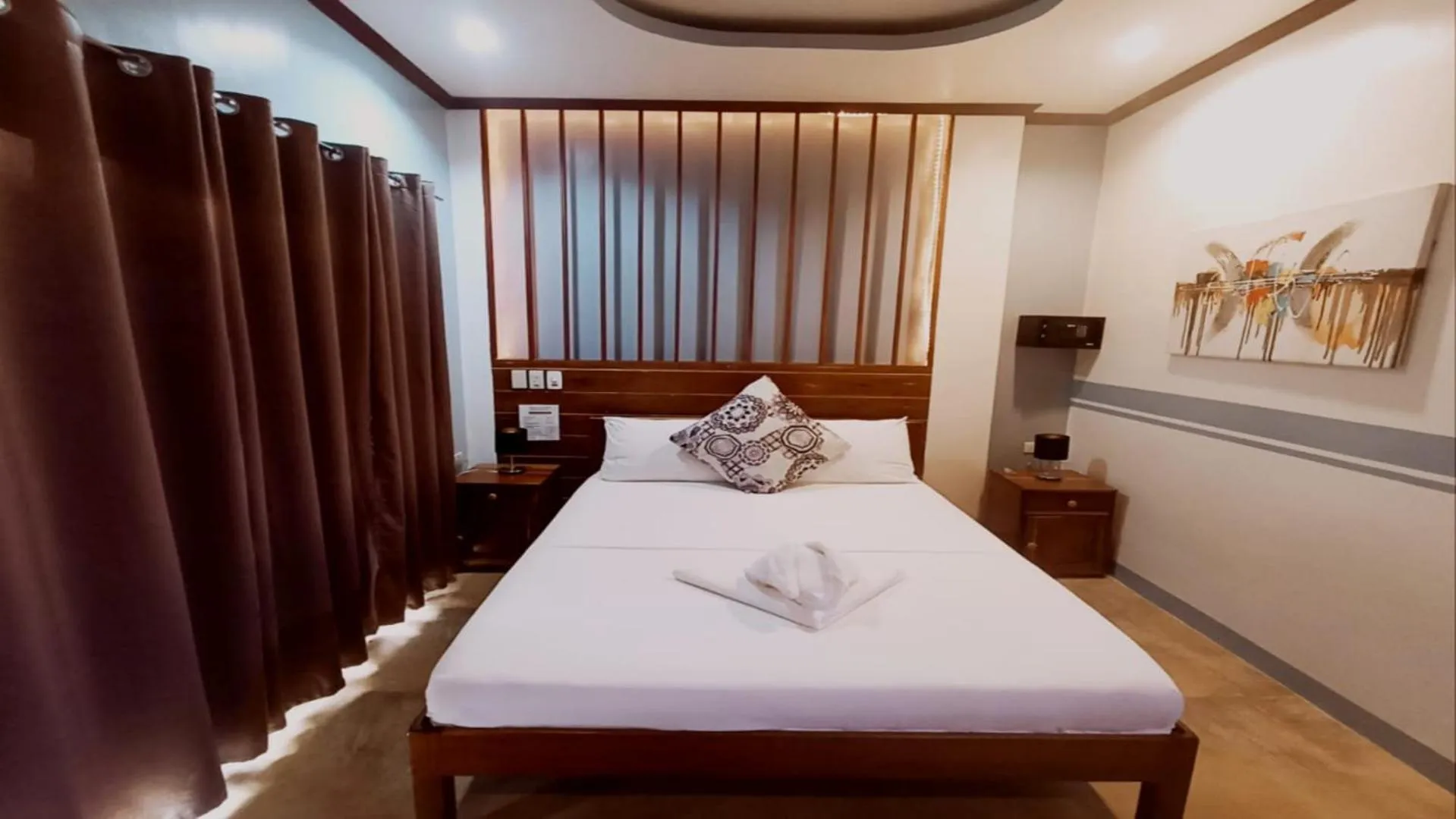 Bed in Hotel Oasis Port Barton