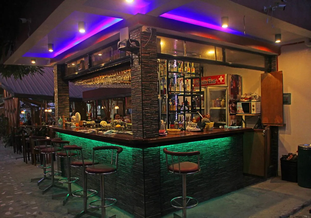 Lounge or bar in Hotel Oasis Port Barton