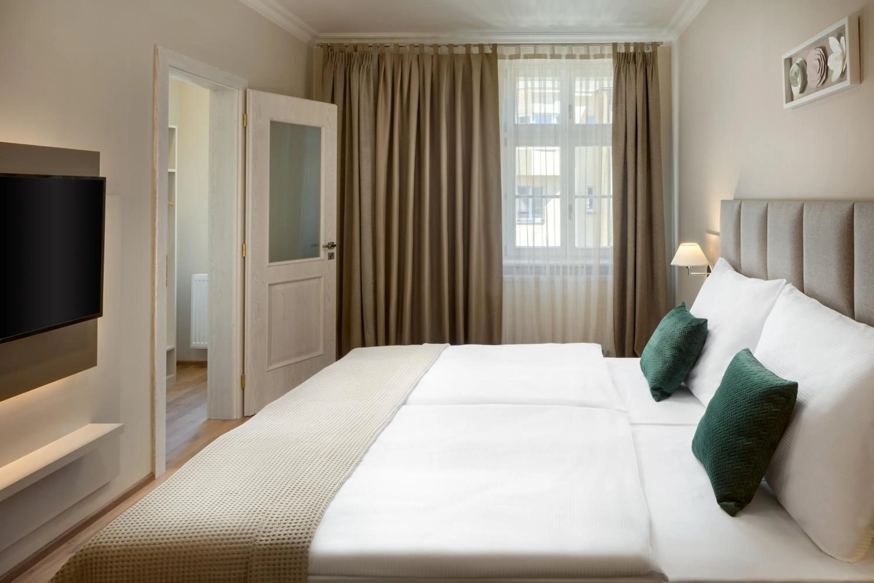 Bed in Louren Apartments